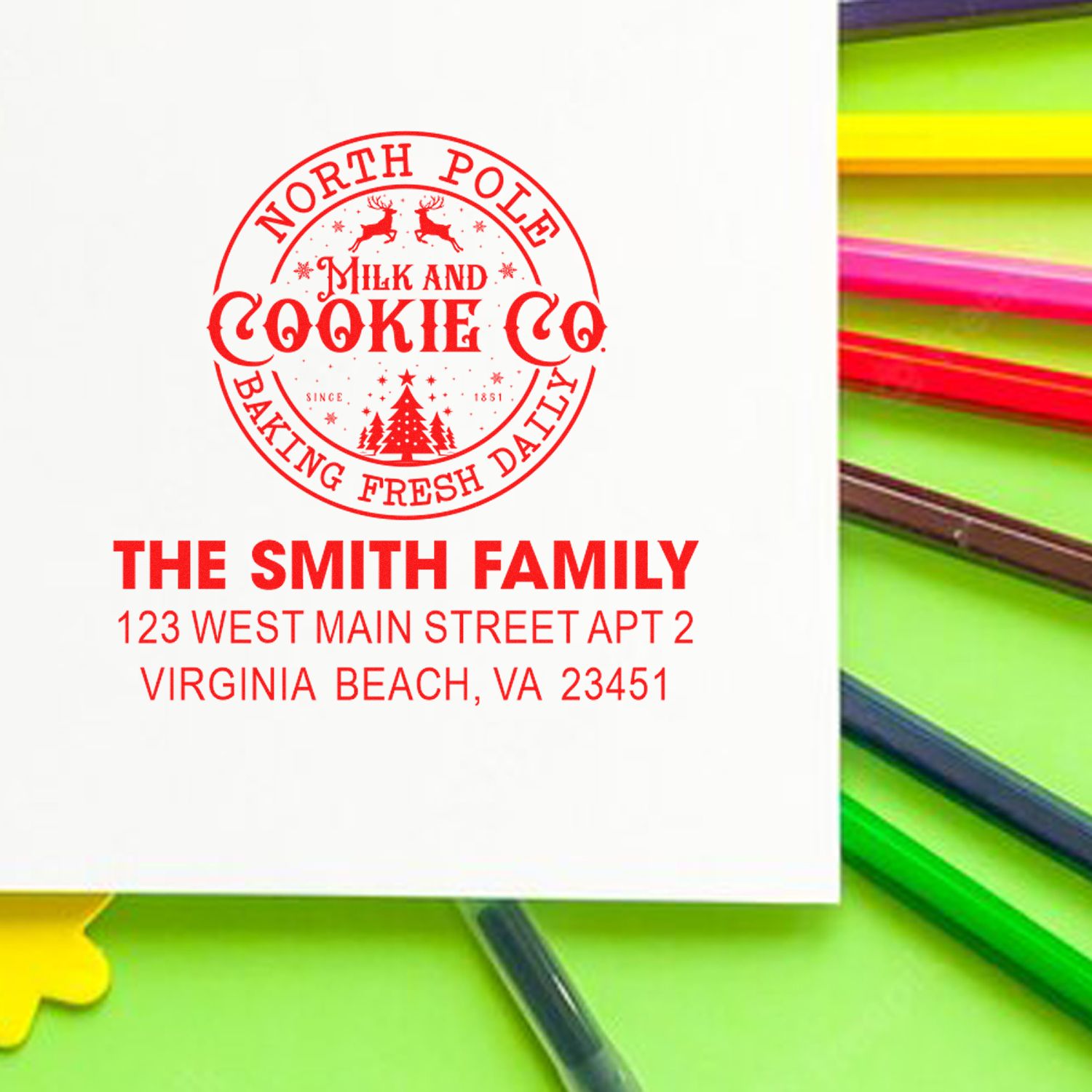 Custom return address rubber stamp with North Pole Milk and Cookie Co logo for the Smith family.