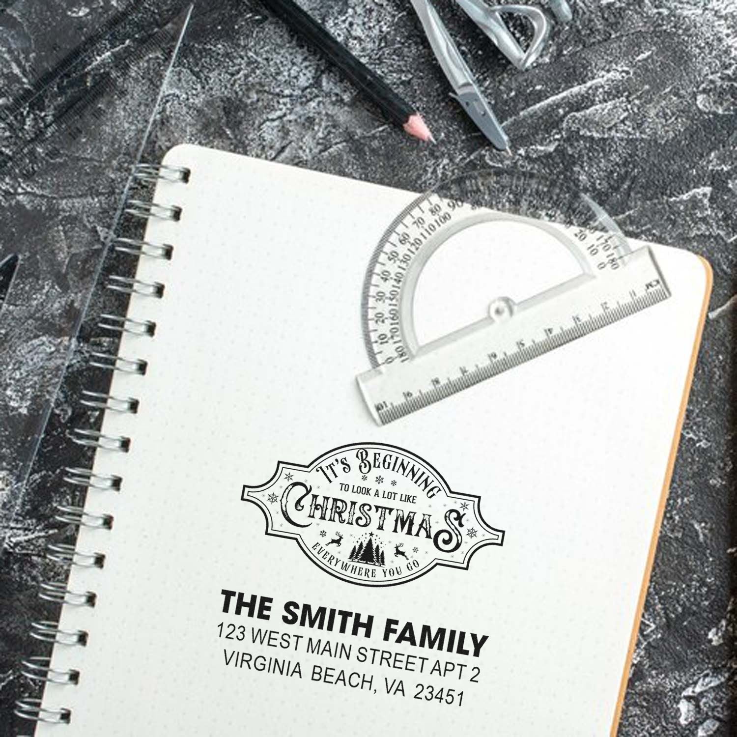 Personalized custom Christmas return address rubber stamp for family stationery.