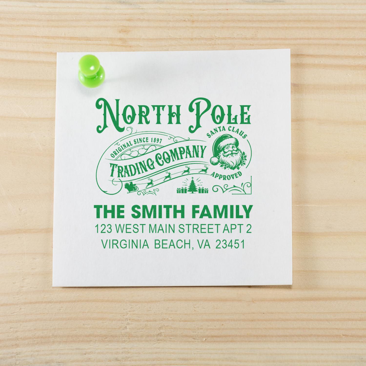 Custom holiday return address rubber stamp with North Pole Trading Company design for The Smith Family, Virginia Beach, VA.