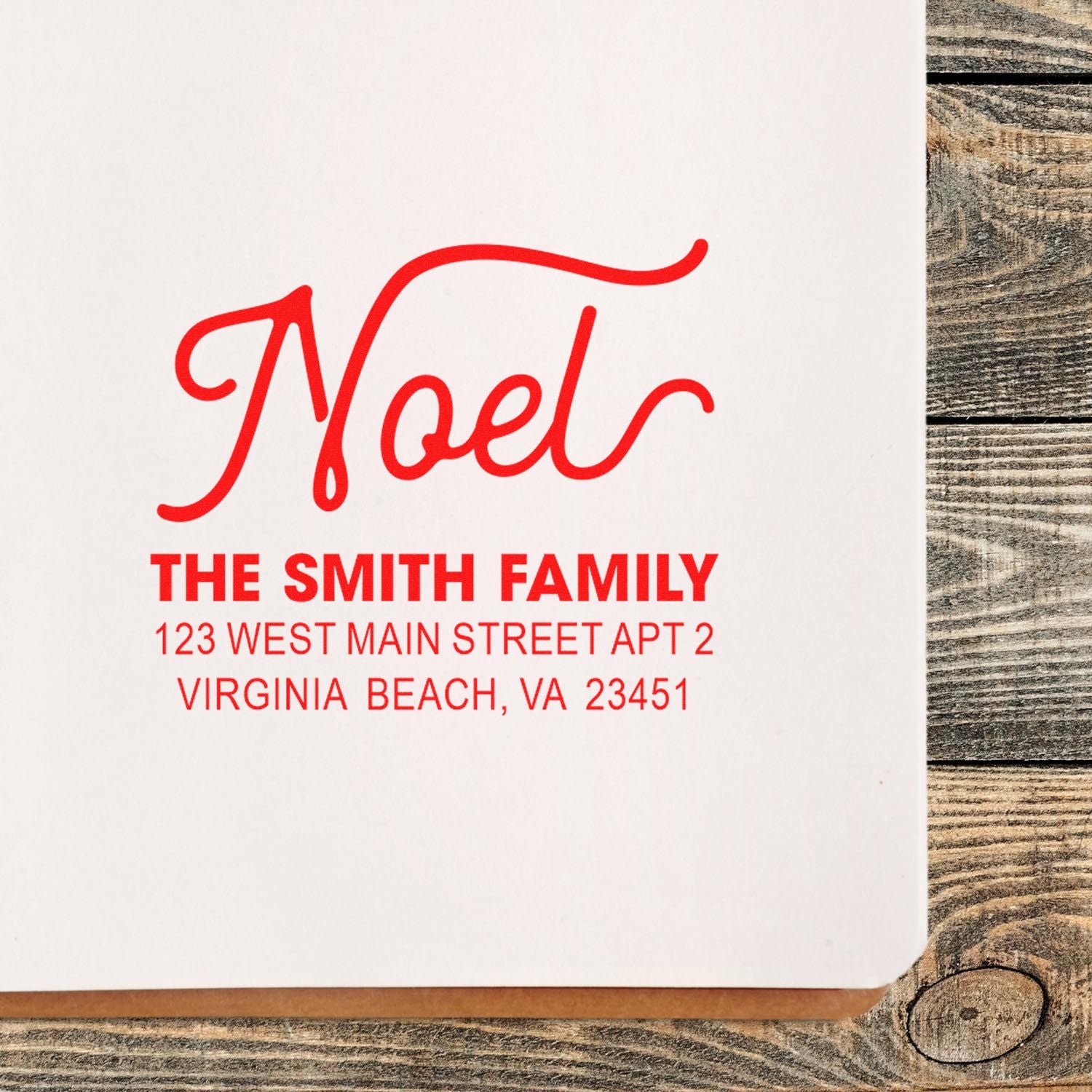 Personalized return address rubber stamp featuring red Noel script and The Smith Family, Virginia Beach address.