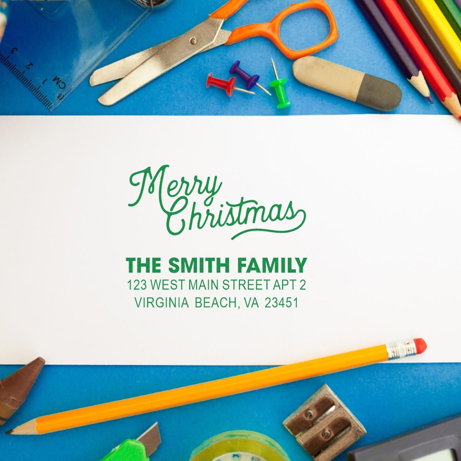 Personalized Merry Christmas return address rubber stamp for The Smith Family holiday envelopes.