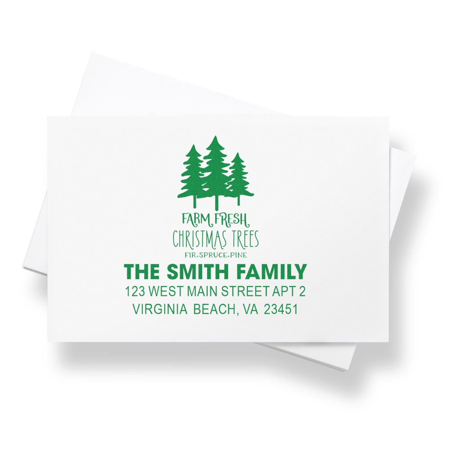 Custom holiday rubber stamp with pine tree logo, Farm Fresh Christmas Trees, and return address for The Smith Family.