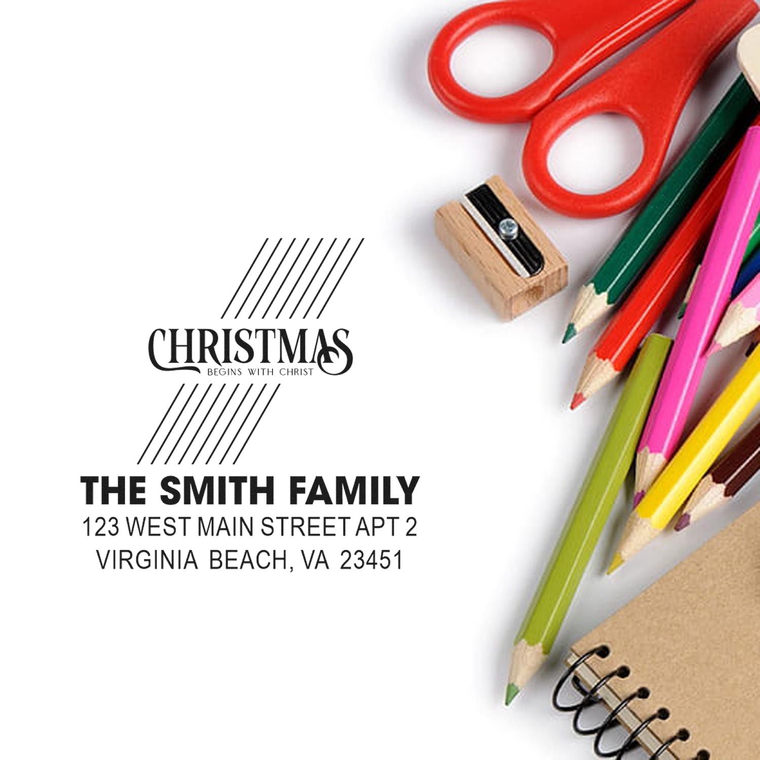 Custom Christmas address rubber stamp for holiday cards, featuring family name and mailing address on a stationery background.