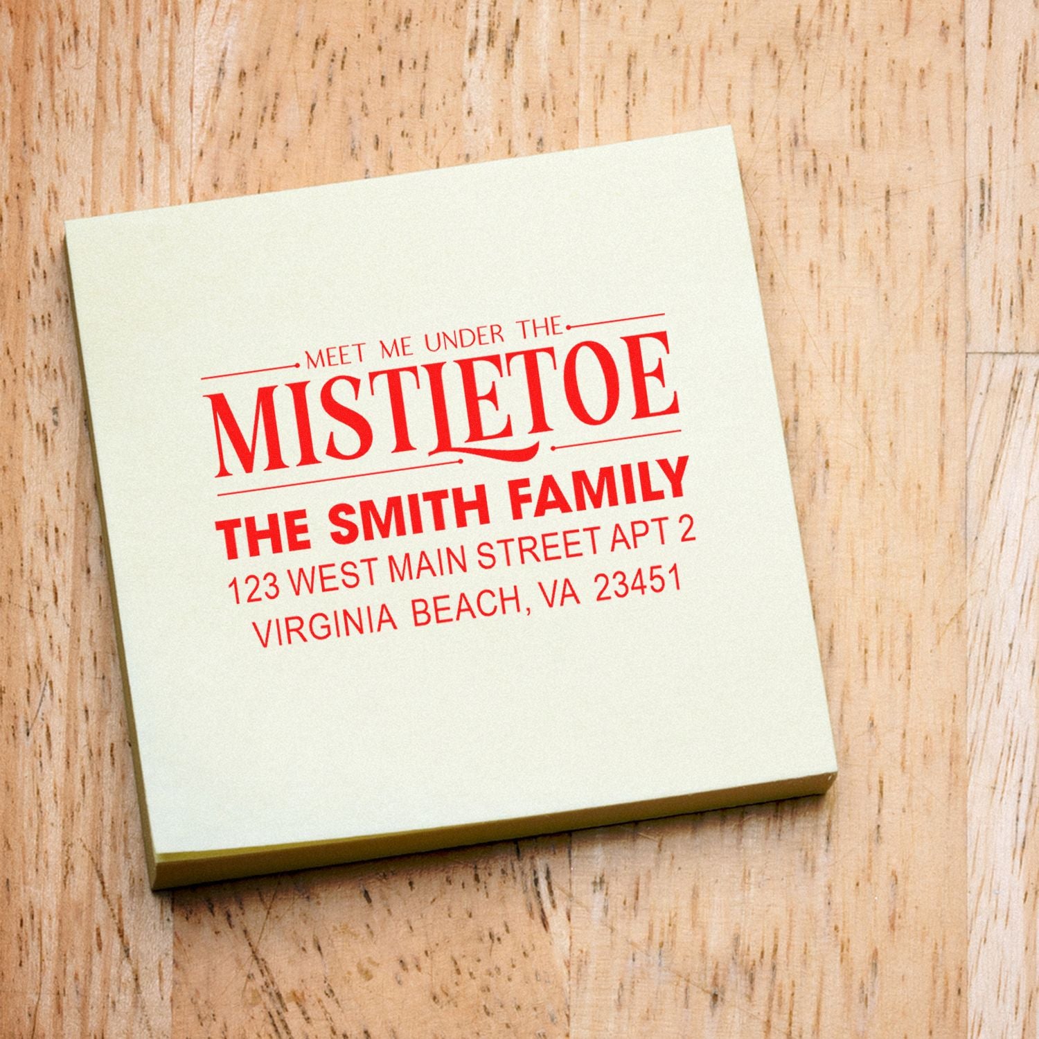 Personalized holiday address rubber stamp with Meet Me Under the Mistletoe and Smith family return address design.