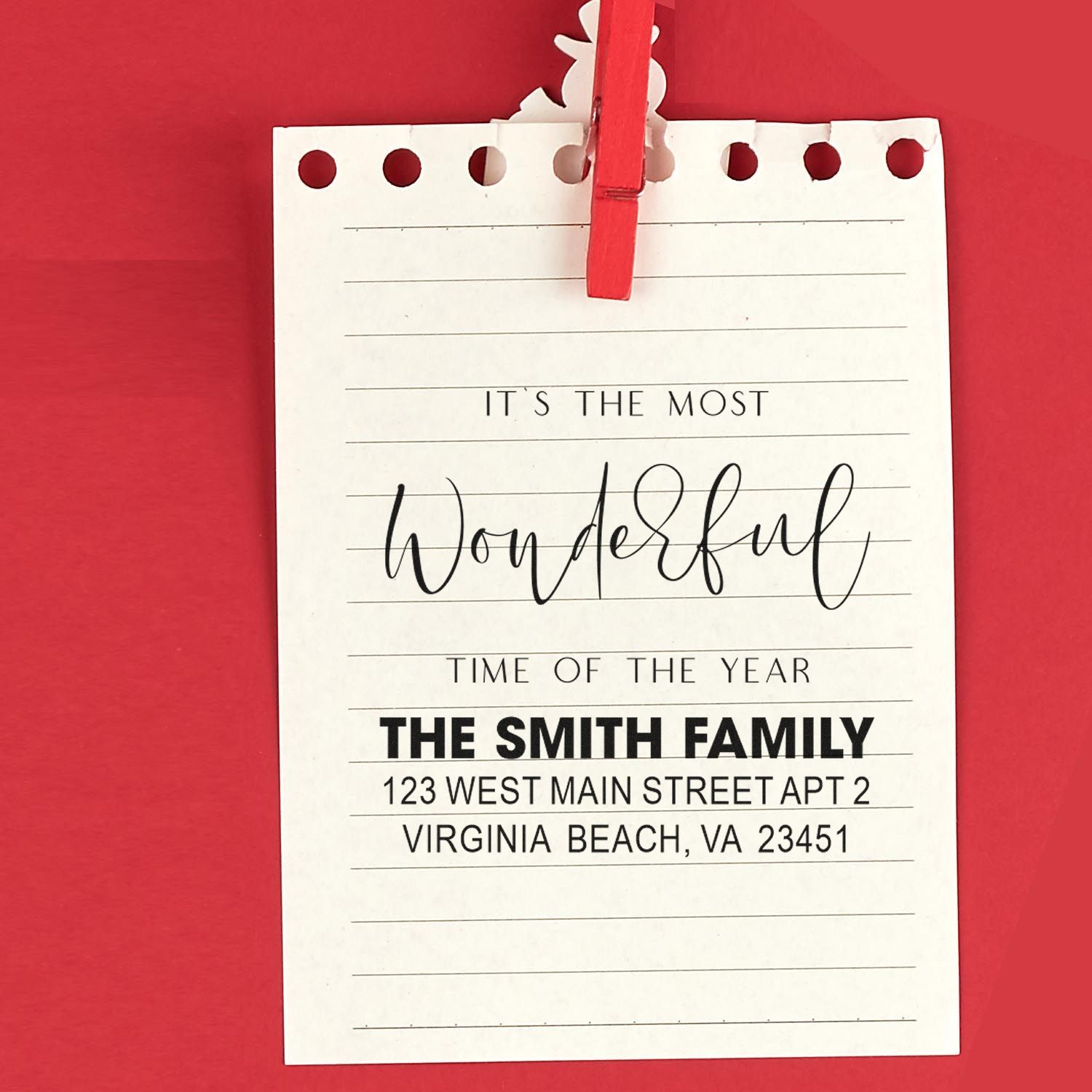 Personalized holiday return address rubber stamp sample for The Smith Family, Virginia Beach, VA, with festive greeting.