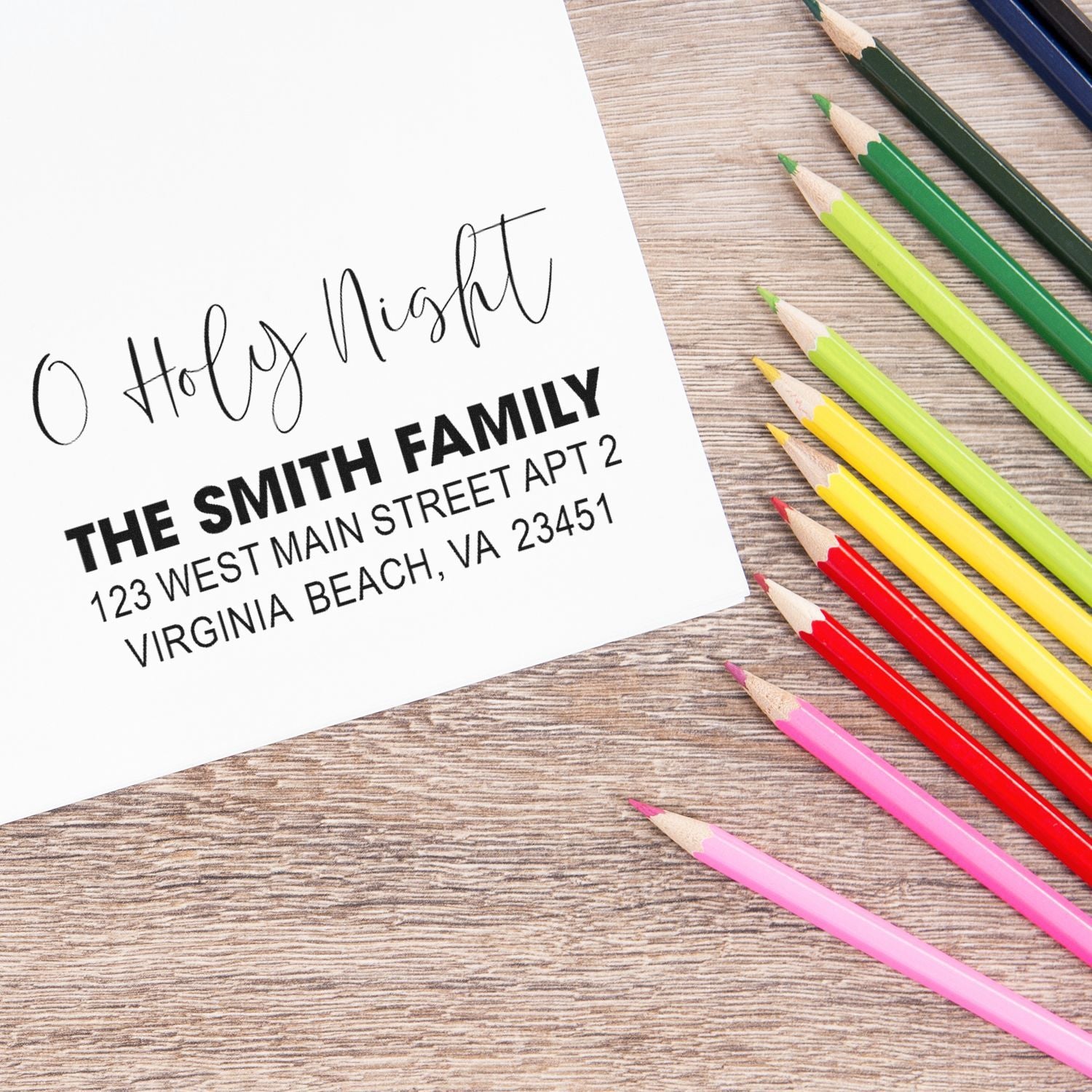 Custom rubber stamp on stationery with Holy Night and Smith family address, ideal for holiday cards and personalized mailings.