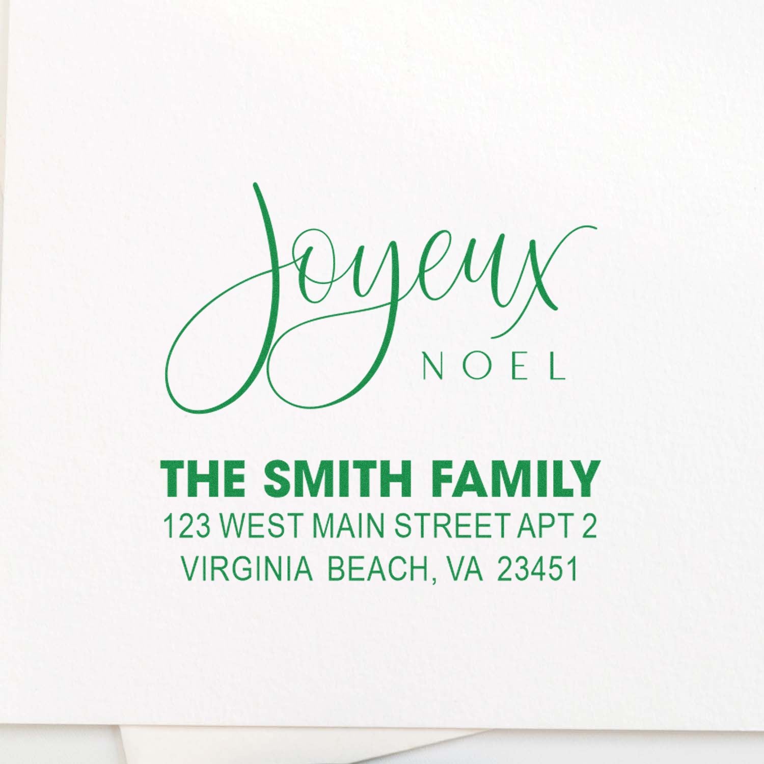 Personalized Joyeux Noel rubber stamp with The Smith Family return address for Christmas cards and holiday mail.