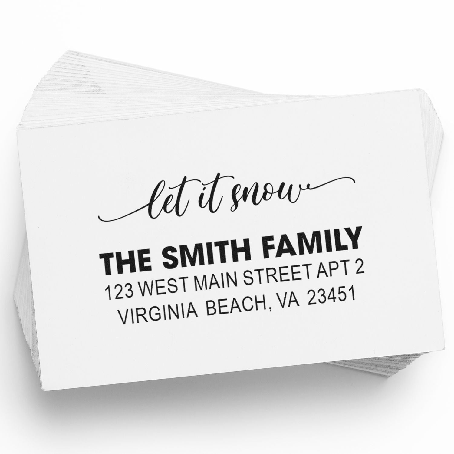 Custom family address rubber stamp with let it snow script and return mailing address for holiday mailings.