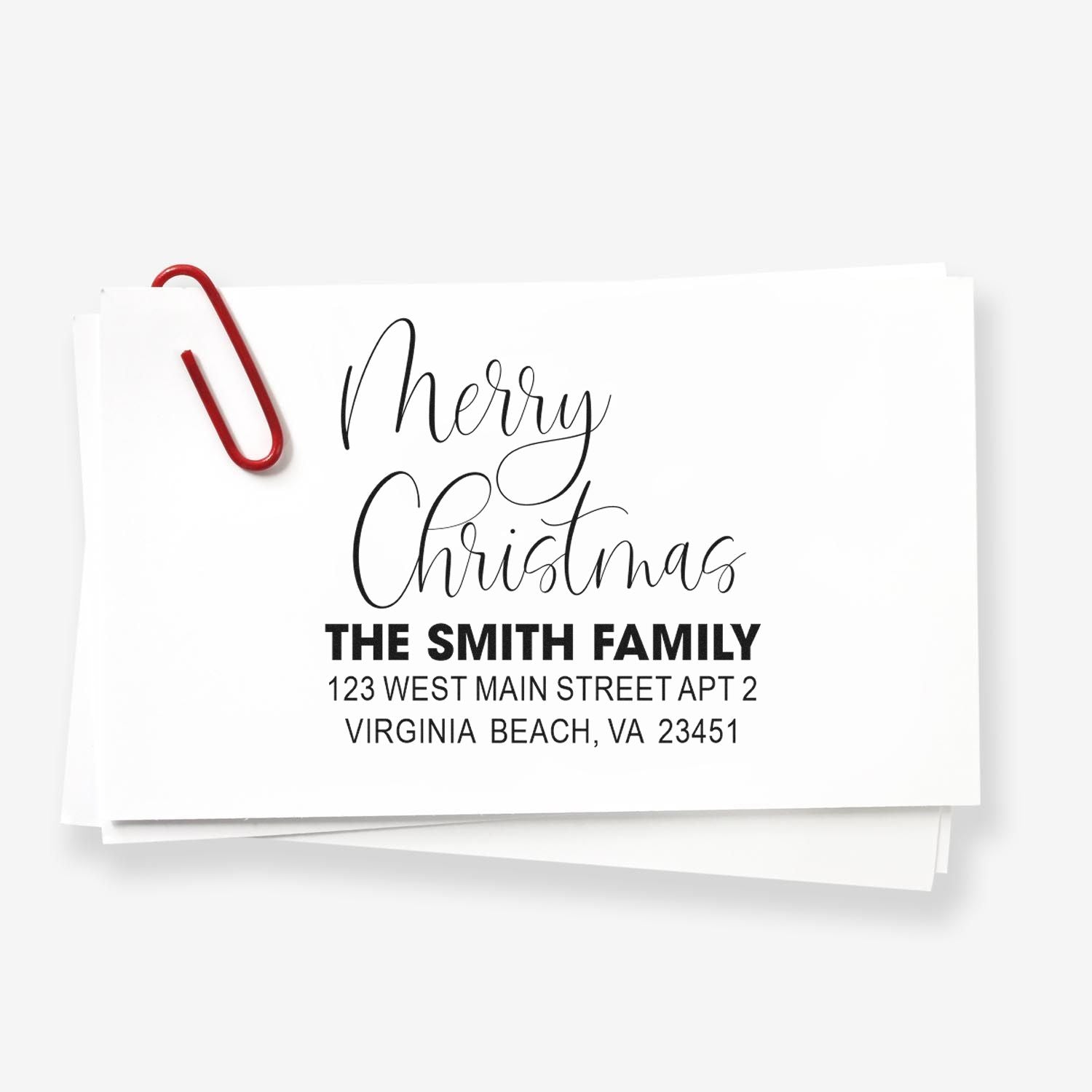 Custom Merry Christmas return address rubber stamp sample with The Smith Family and Virginia Beach, VA address.