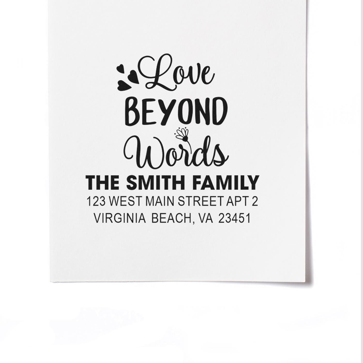 Custom return address rubber stamp with Love Beyond Words design, Smith family name, and personalized mailing address.
