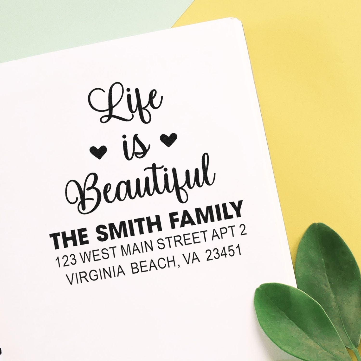 Custom rubber stamp with Life is Beautiful design and personalized return address for The Smith Family.