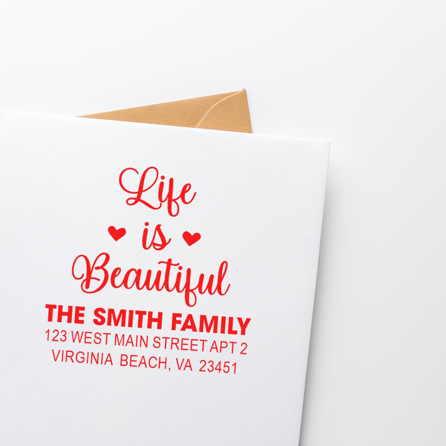 Custom rubber address stamp for The Smith Family with Life is Beautiful design on greeting card