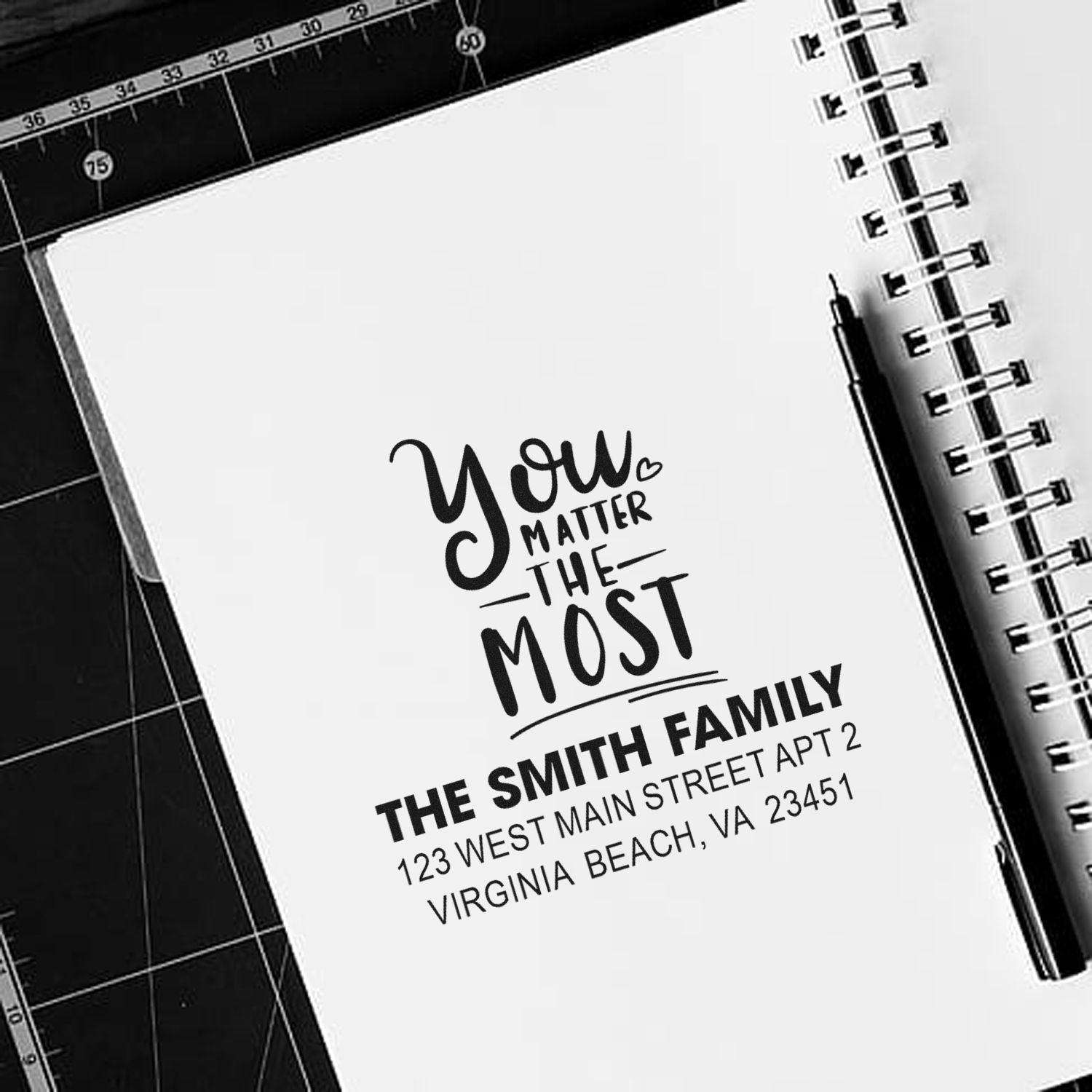 Custom rubber stamp design with You Matter the Most and personalized family address for stationery, gifts, or mailings.