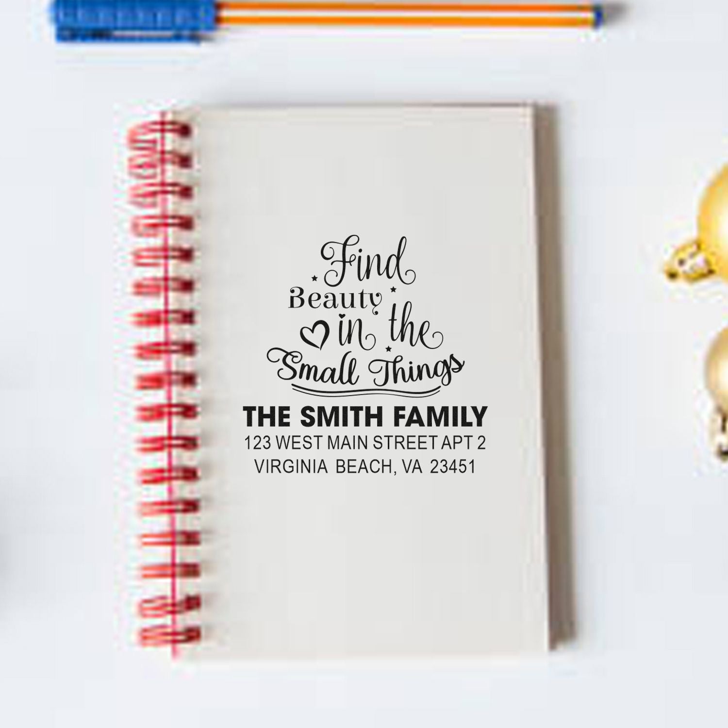 Personalized address rubber stamp with Find Beauty in the Small Things design for custom family stationery and notebooks.