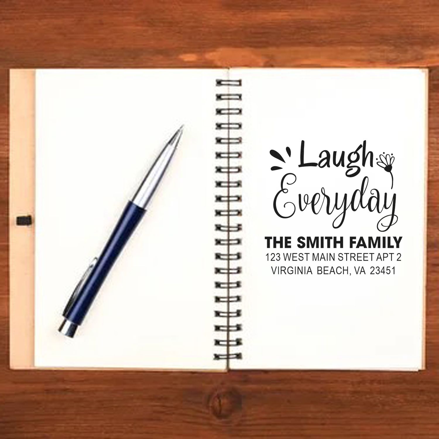 Custom return address rubber stamp with Laugh Everyday design for personalized stationery and mail.