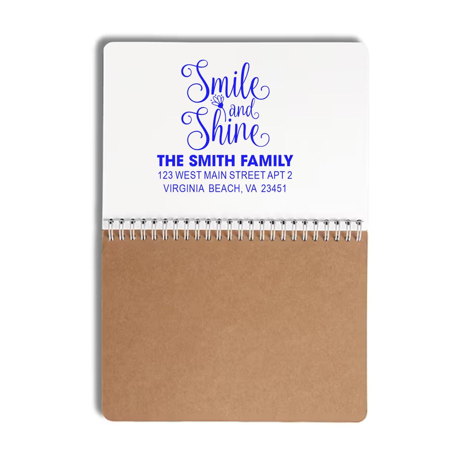 Custom rubber stamp design with Smile and Shine, family name, and return address for personalized mail and stationery.
