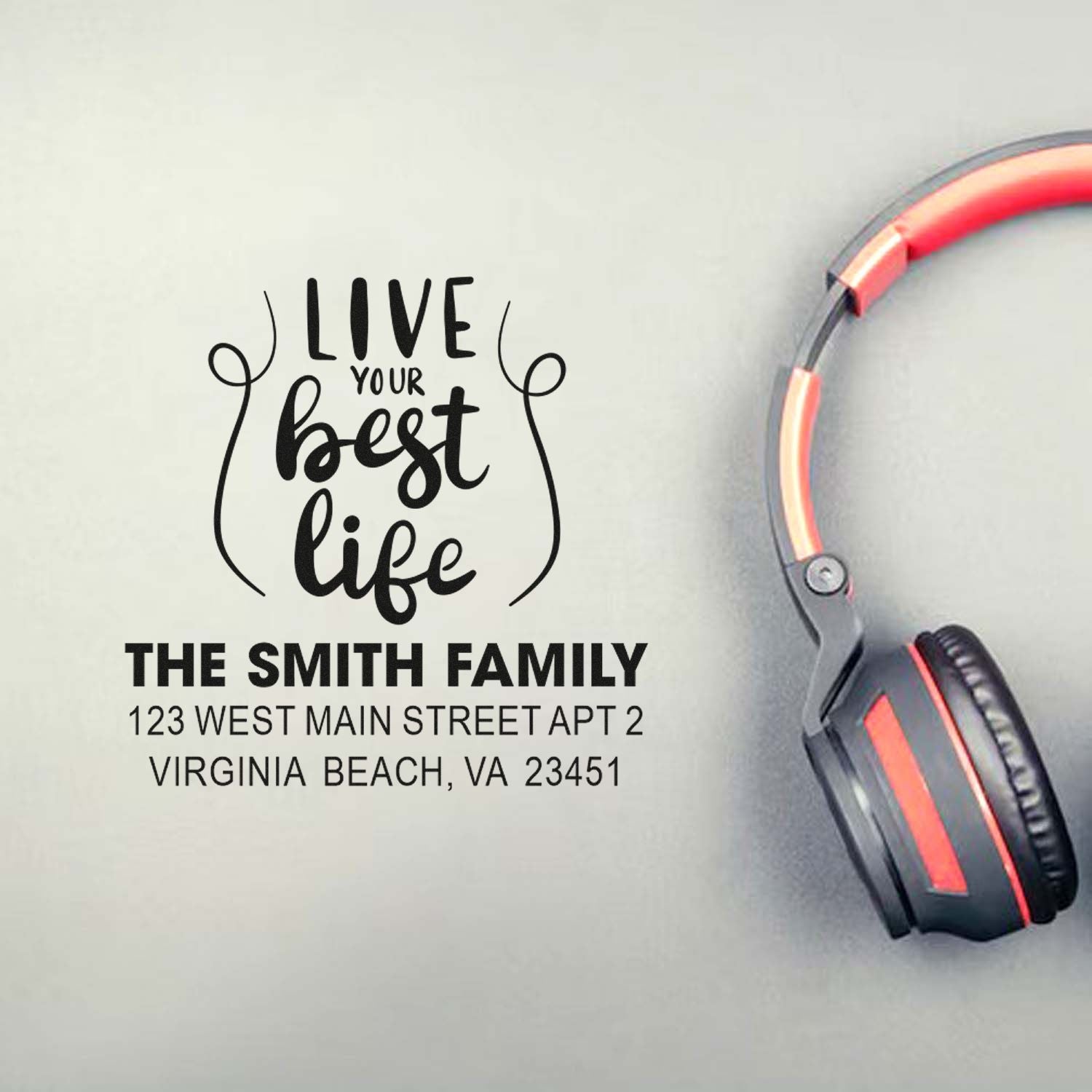 Custom return address rubber stamp with "Live Your Best Life" design for The Smith Family mailing envelopes.