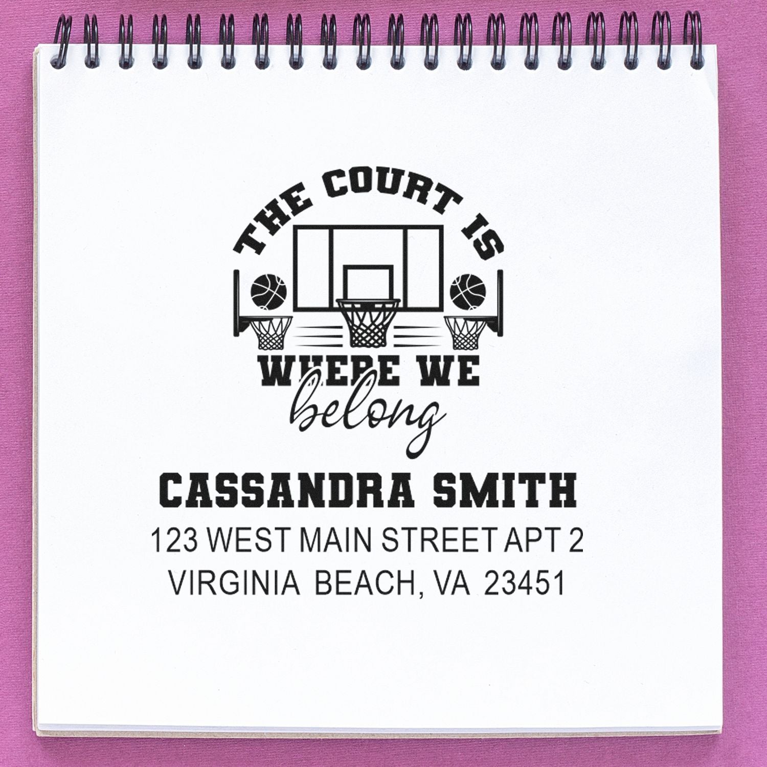 Custom basketball return address rubber stamp with slogan "The court is where we belong" for personalized mailings.