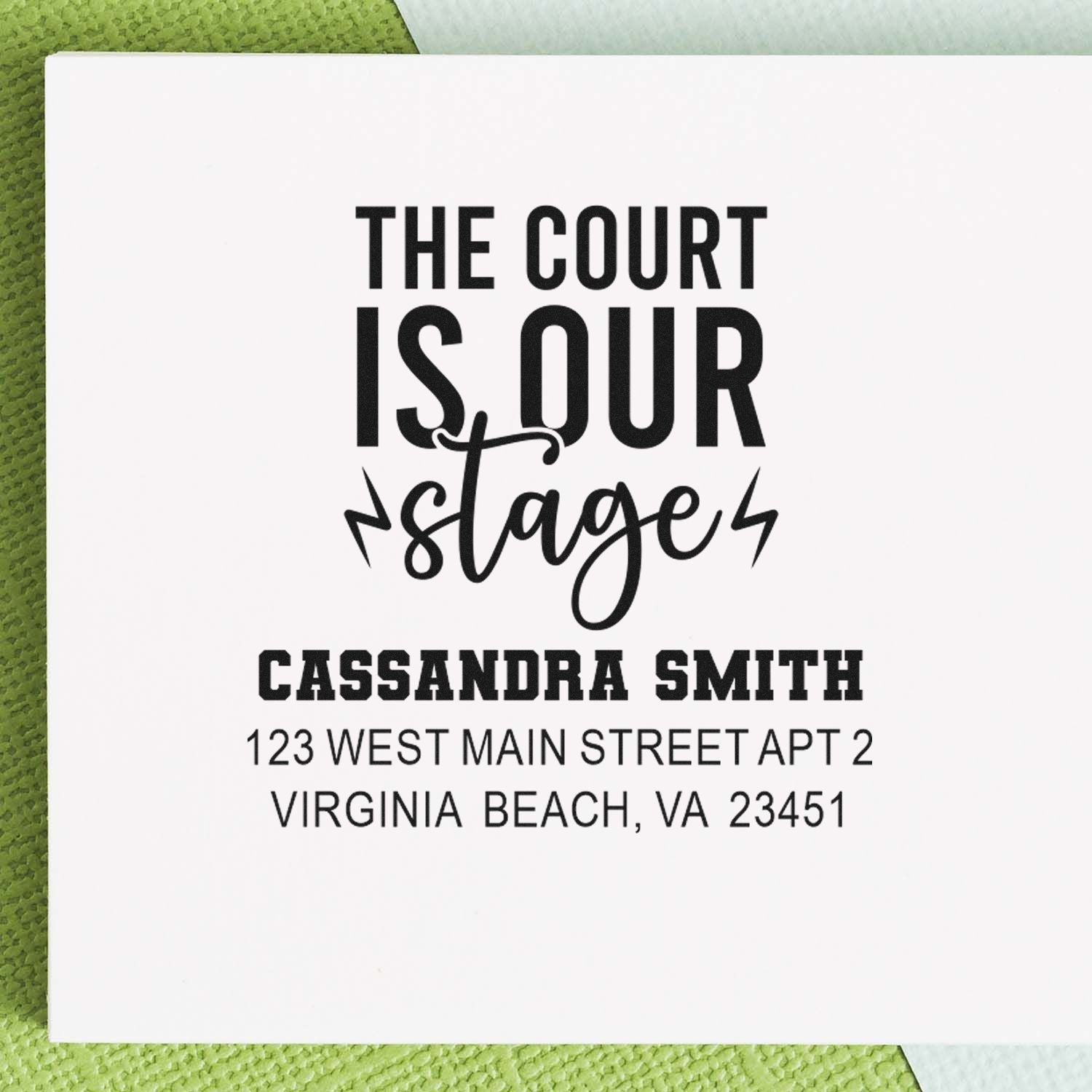 Custom rubber address stamp with The Court Is Our Stage design, featuring Cassandra Smiths Virginia Beach, VA address.