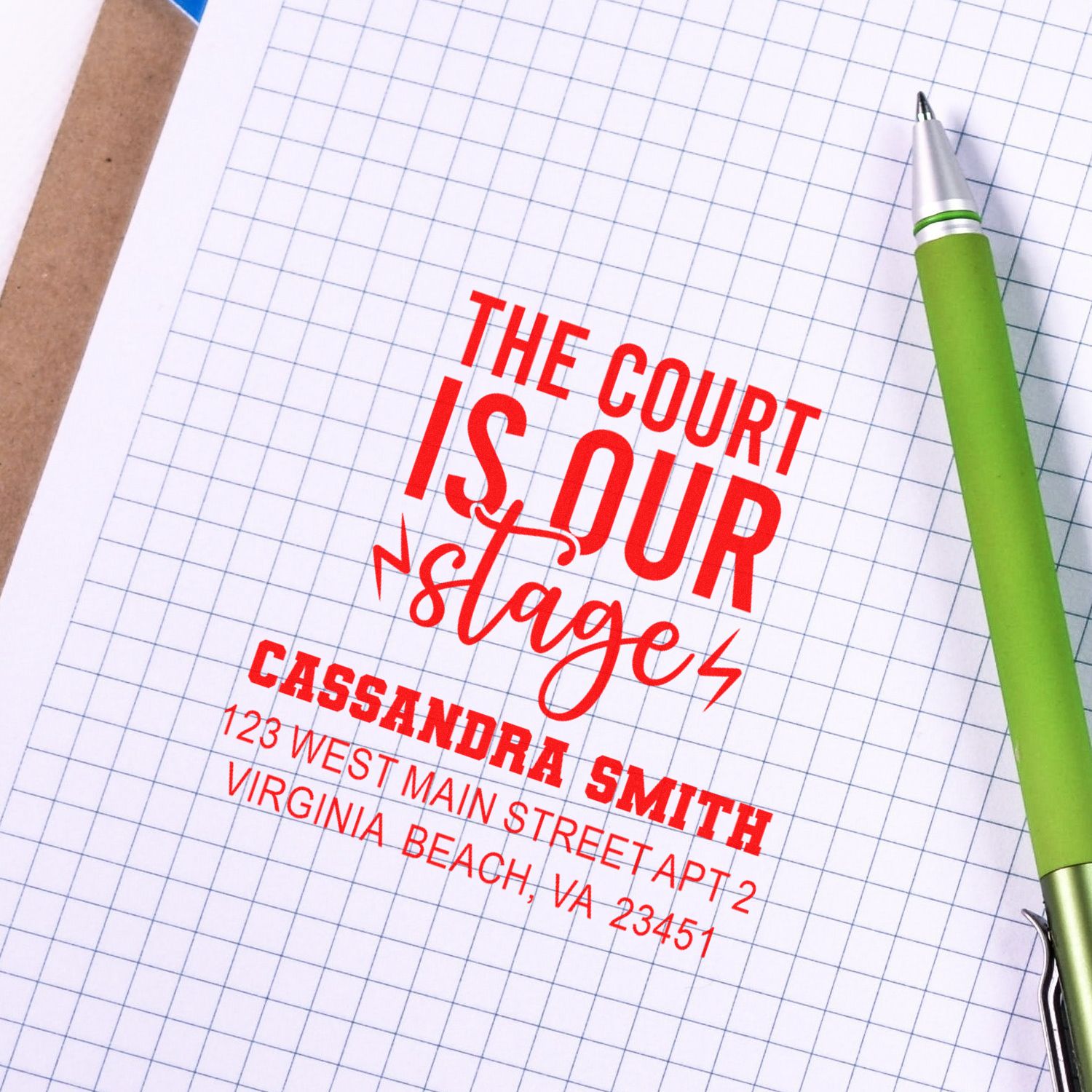Personalized rubber stamp design with The Court Is Our Stage return address imprint for law office branding.