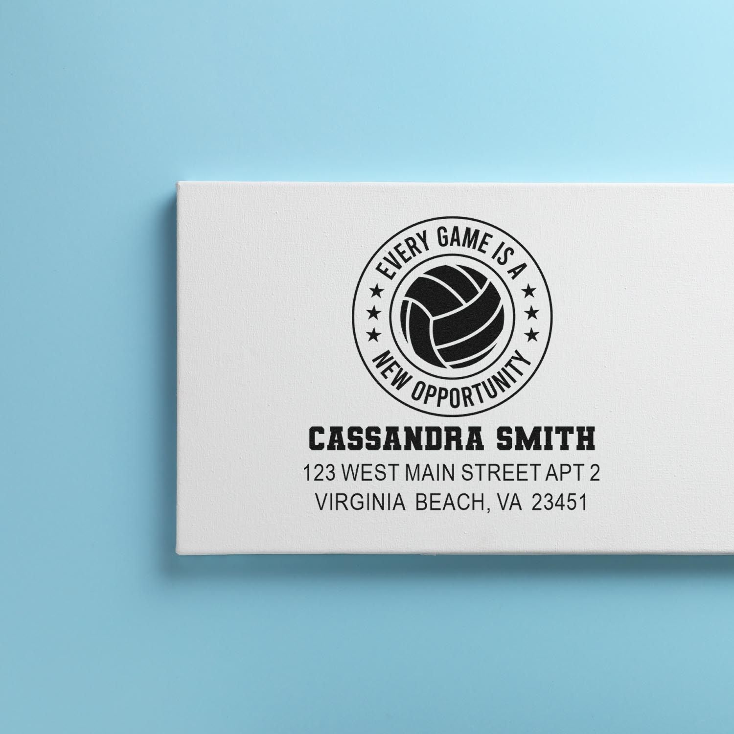 Custom volleyball address rubber stamp with name and address, ideal for personalized sports team branding.
