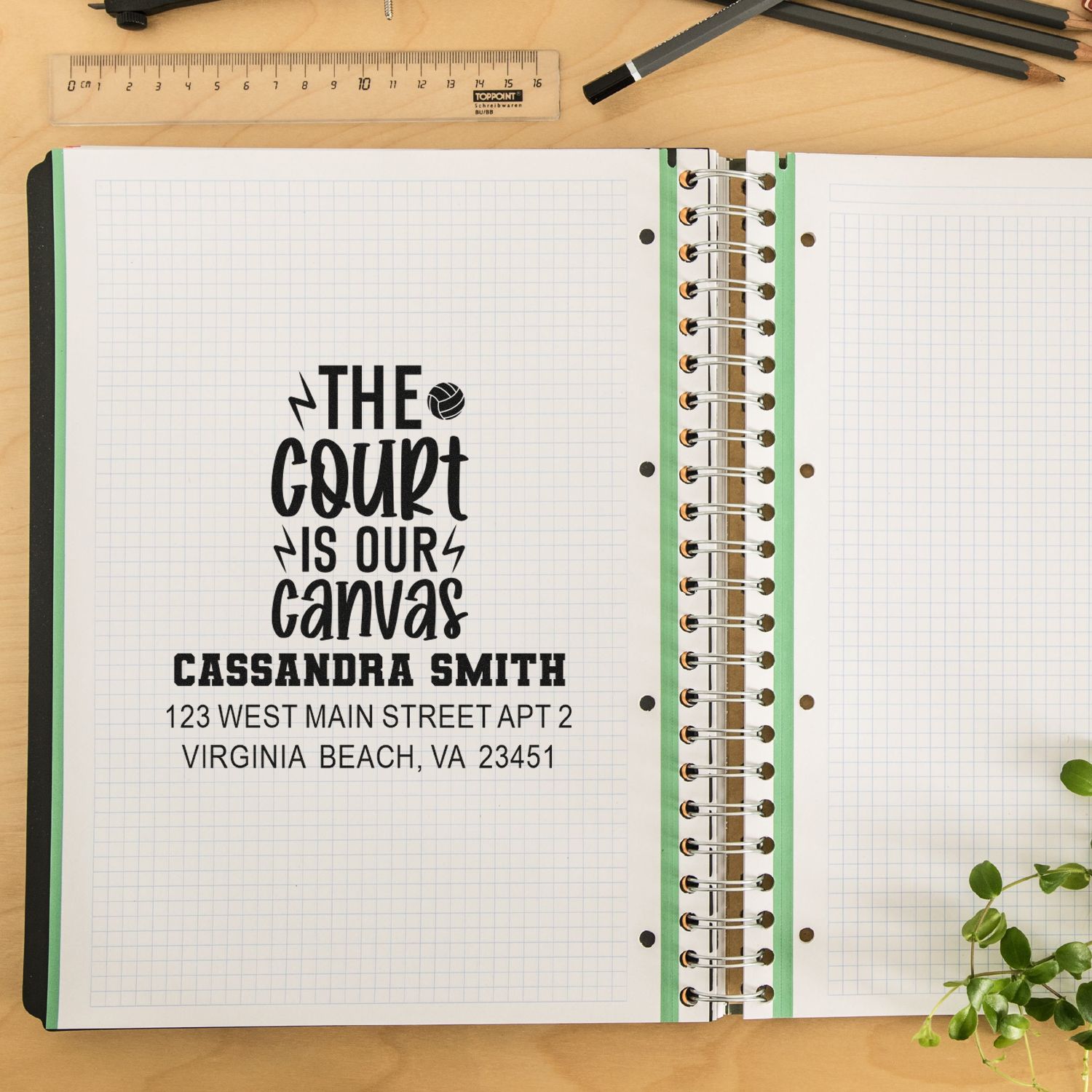 Custom volleyball return address rubber stamp impression in an open notebook, featuring The court is our canvas.