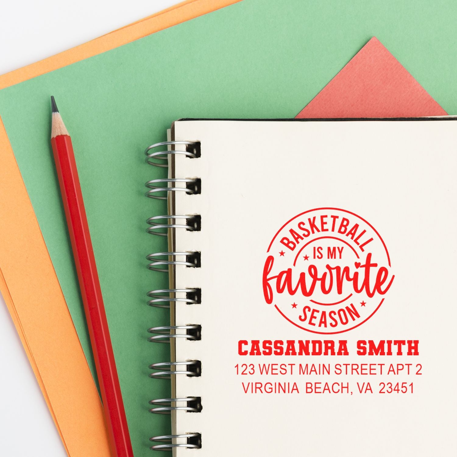 Personalized basketball rubber stamp with name and address on notebook, ideal for custom sports stationery.