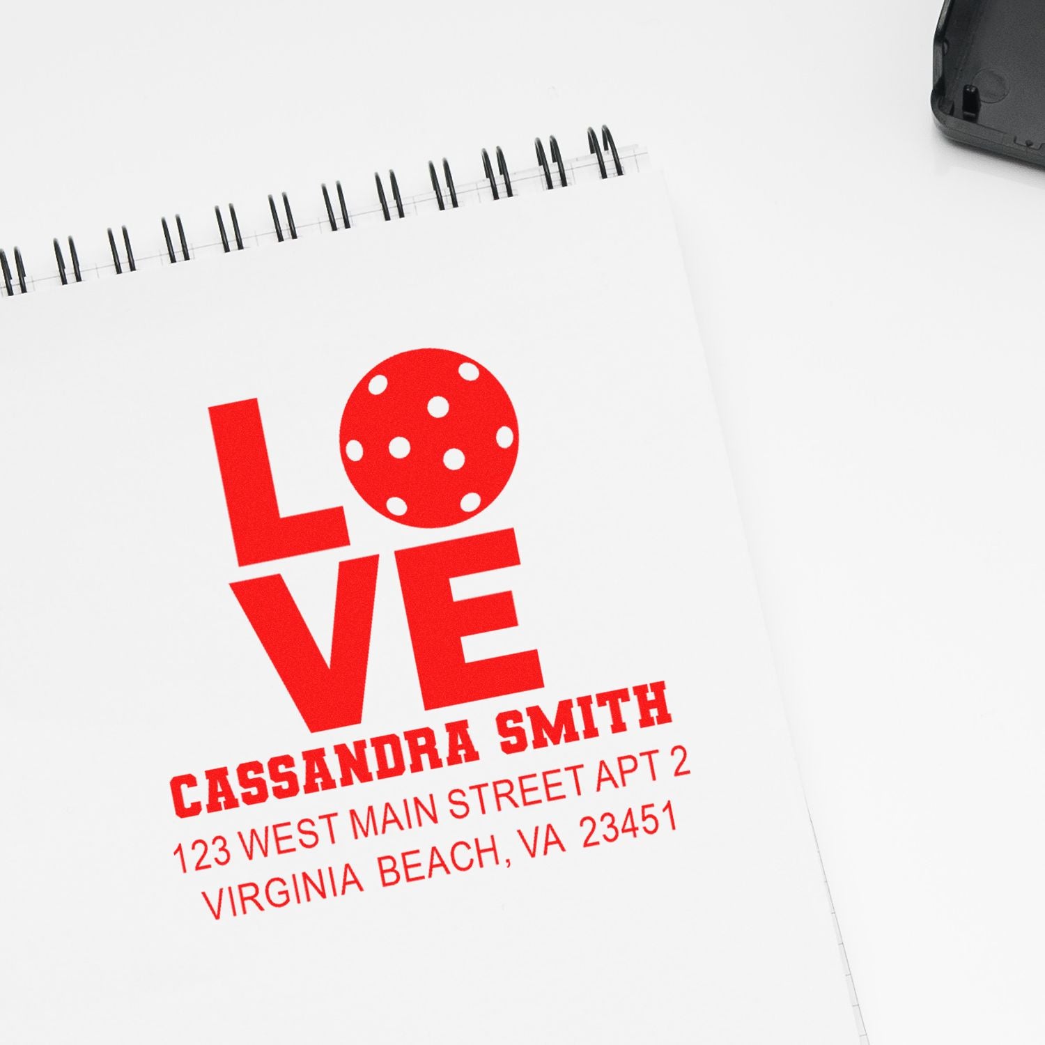 Custom LOVE address stamp with name and Virginia Beach address for personalized stationery and invitations.