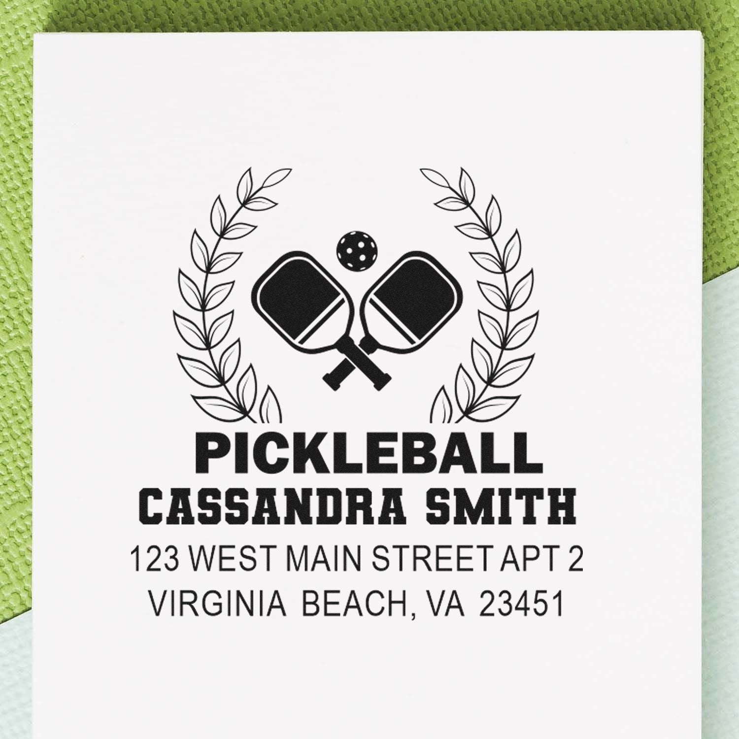 Custom pickleball address rubber stamp with crossed paddles, laurel wreath, and personalized name and Virginia Beach address.