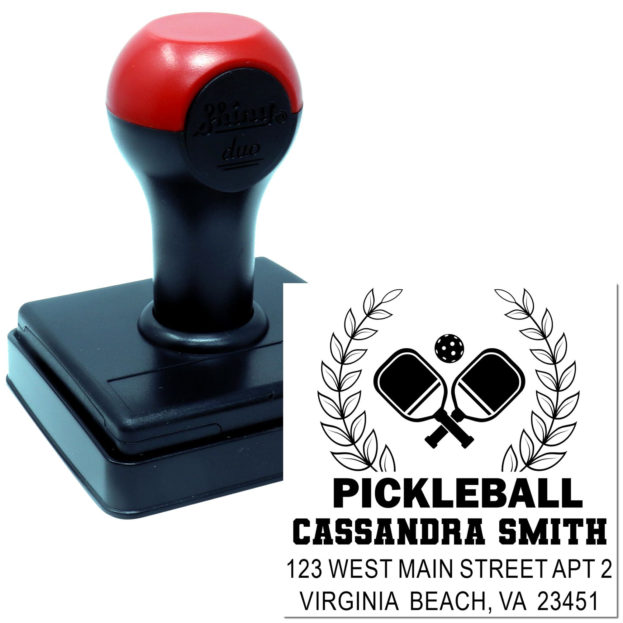 Custom pickleball rubber stamp with crossed paddles, laurel wreath, name, and address for personalized marking.