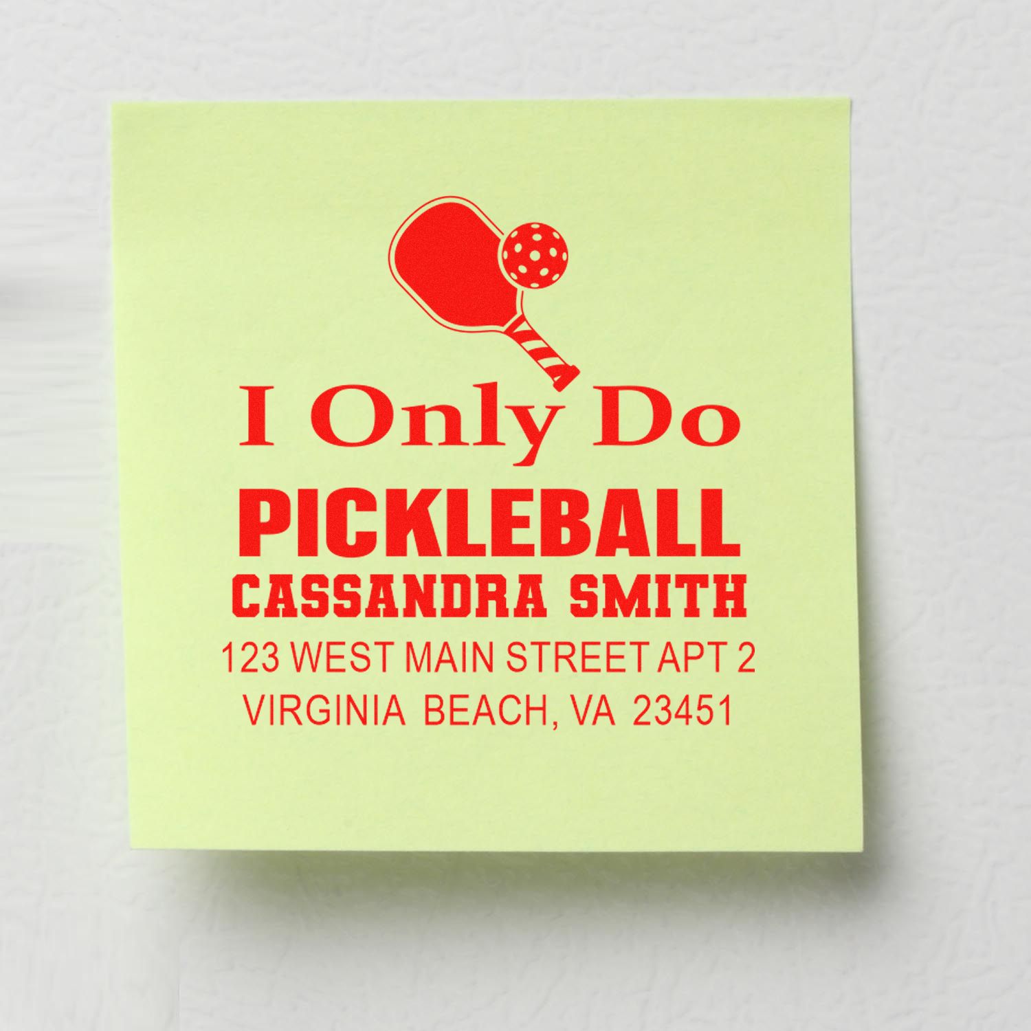 Custom pickleball return address rubber stamp with paddle icon, name Cassandra Smith, and mailing address text.
