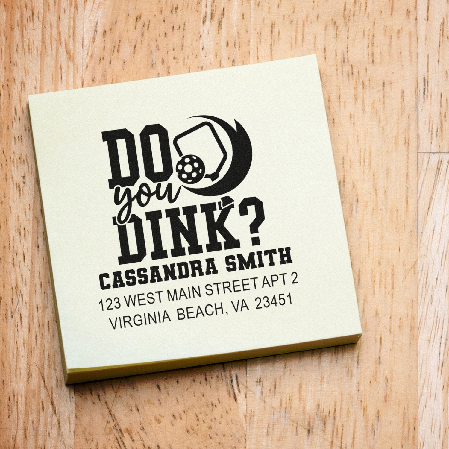 Custom pickleball rubber stamp with Do You Dink? design, name, and address on a wood-backed block.