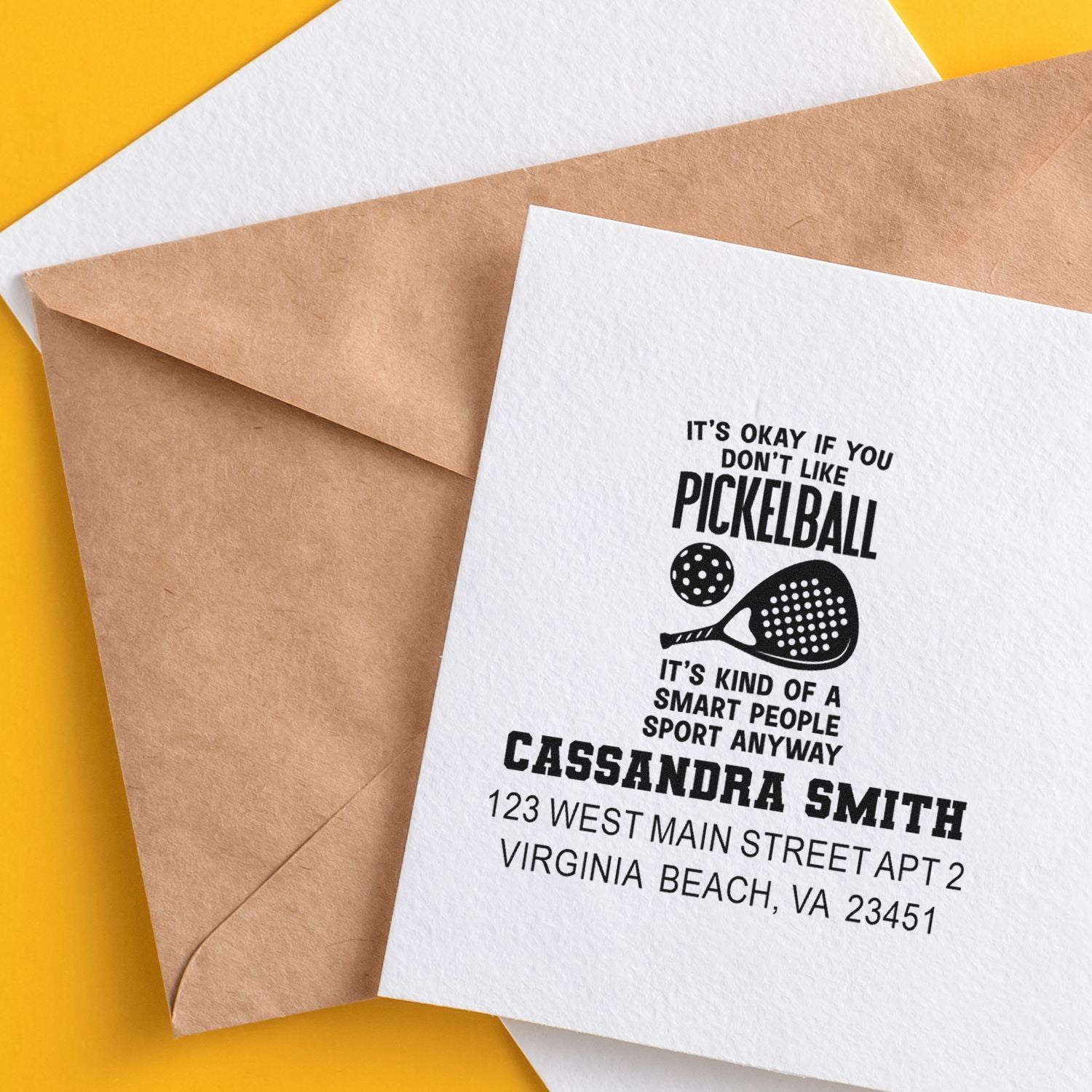 Personalized rubber stamp on envelope with pickleball design and return address for custom mailing and stationery