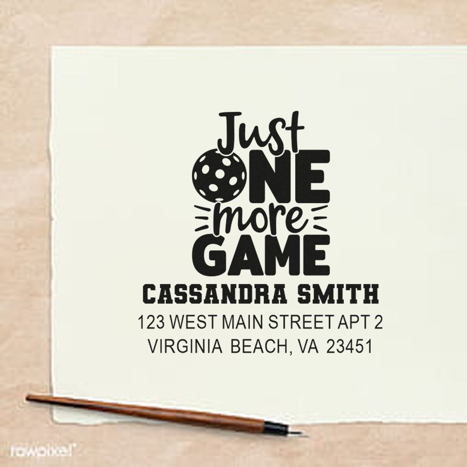 Custom pickleball return address rubber stamp with Just One More Game, name, and mailing address.
