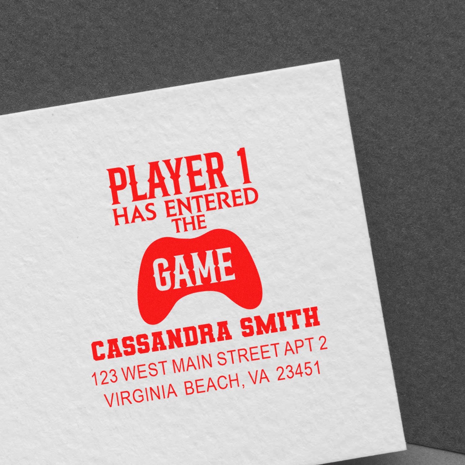 Personalized gamer rubber stamp with controller icon and Player 1 Has Entered the Game return address design.