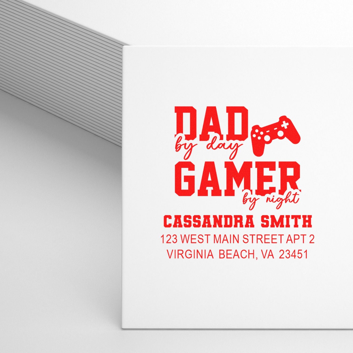 Custom return address rubber stamp for gamer dad: Dad by day, Gamer by night for Cassandra Smith, Virginia Beach, VA.