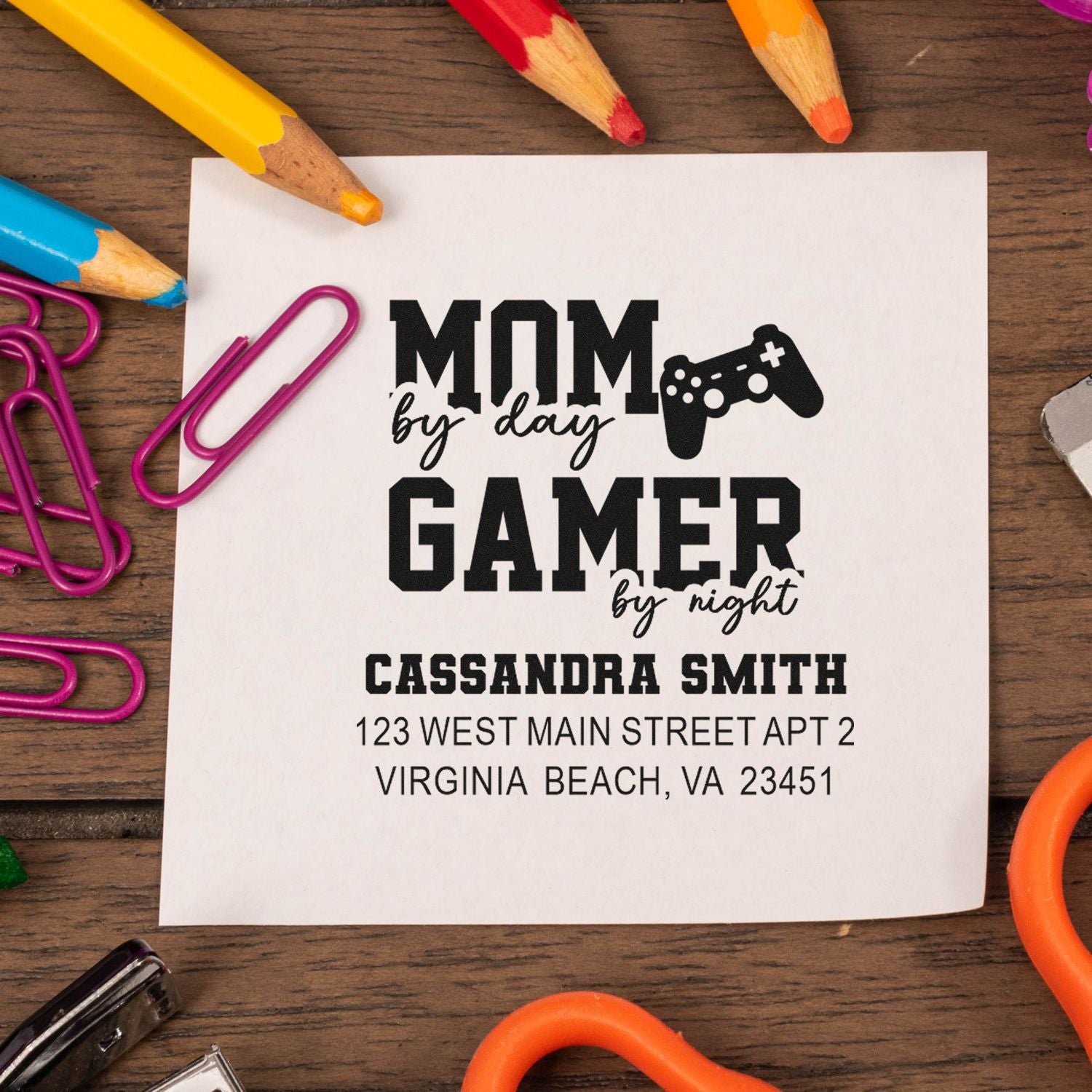 Personalized address rubber stamp featuring Mom by Day Gamer by Night design with name and address for mailing labels and crafts.