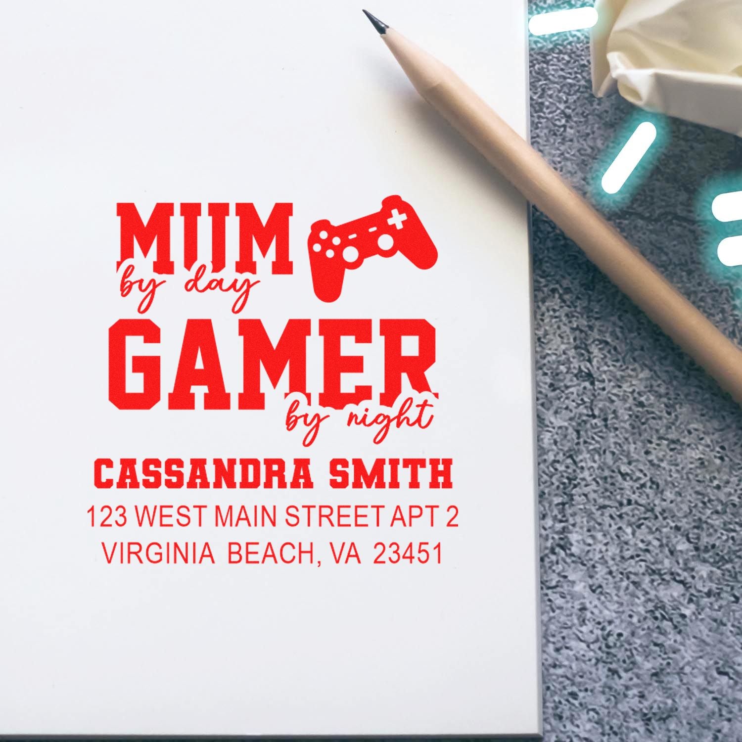 Personalized rubber stamp design for a gamer mom return address, reading Mum by day, gamer by night with custom details.