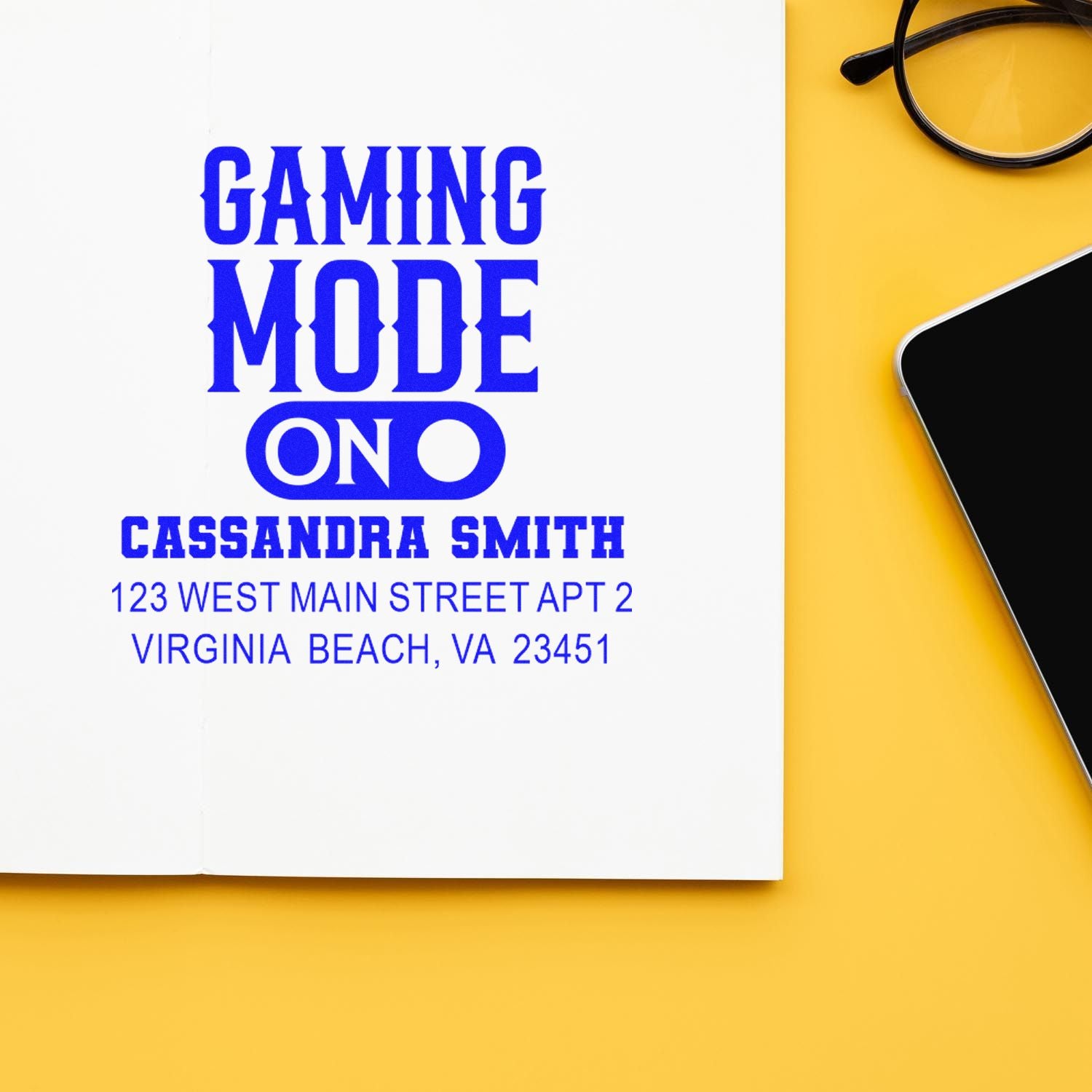 Custom rubber stamp impression for Gaming Mode On with name and address, ideal for personalized gamer stationery.