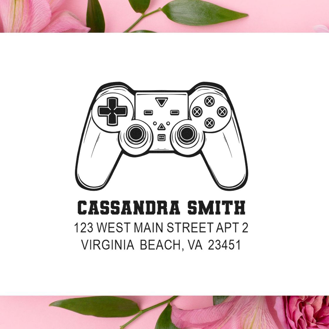 Custom address rubber stamp with game controller design for Cassandra Smith, Virginia Beach, VA 23451.