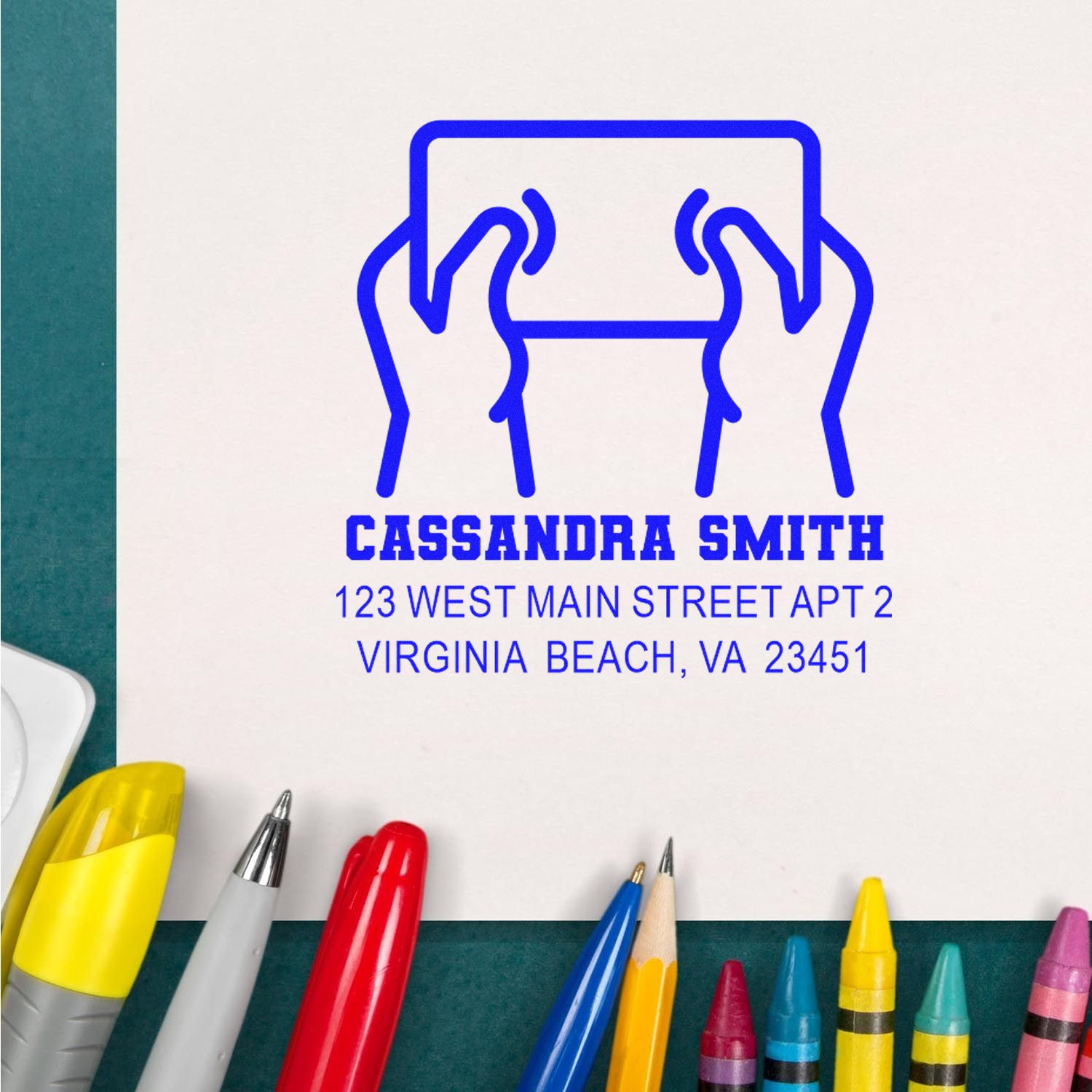 Custom return address rubber stamp for Cassandra Smith, Virginia Beach, VA, with hands-and-envelope logo.