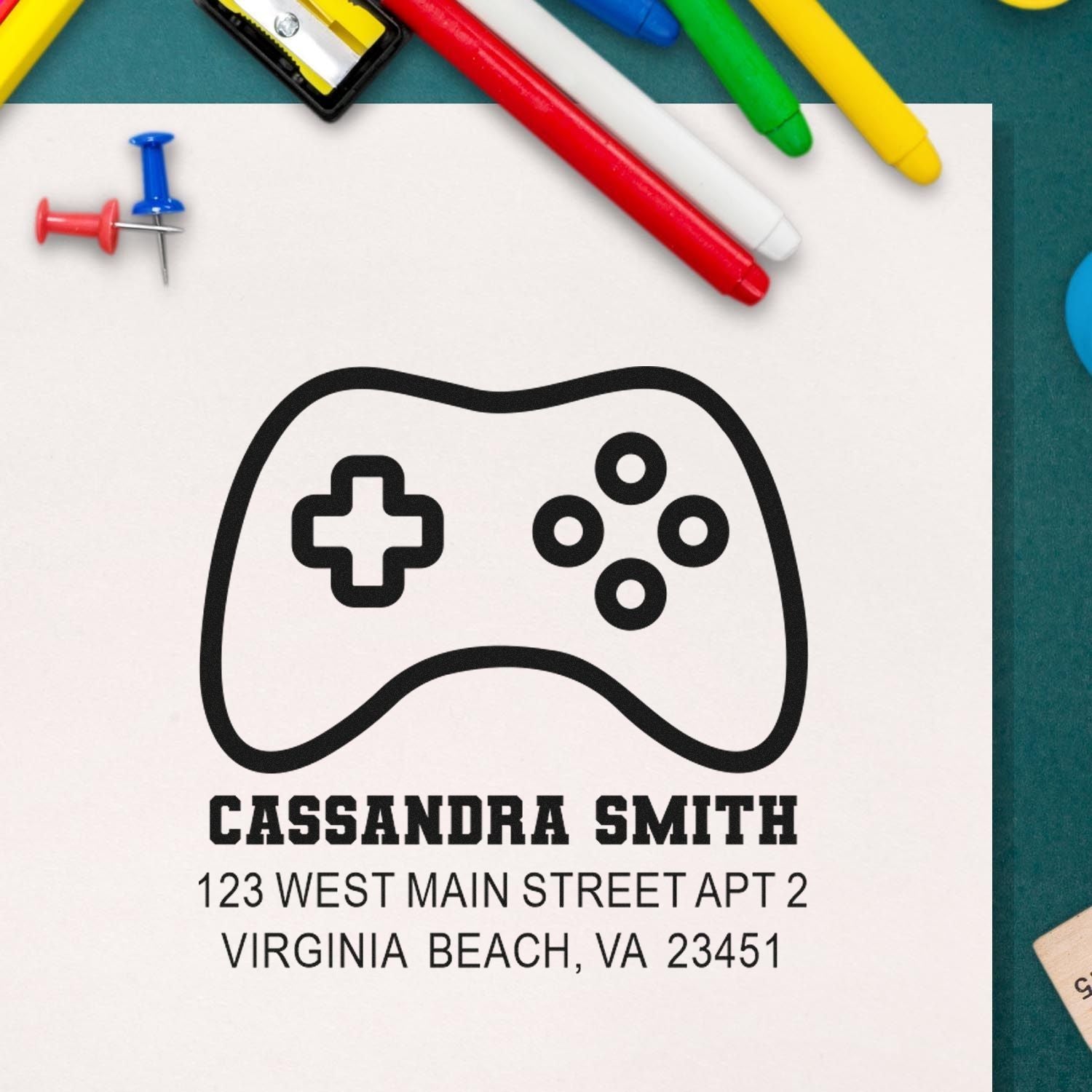 Personalized gamer address rubber stamp with controller icon for custom return address on mail.