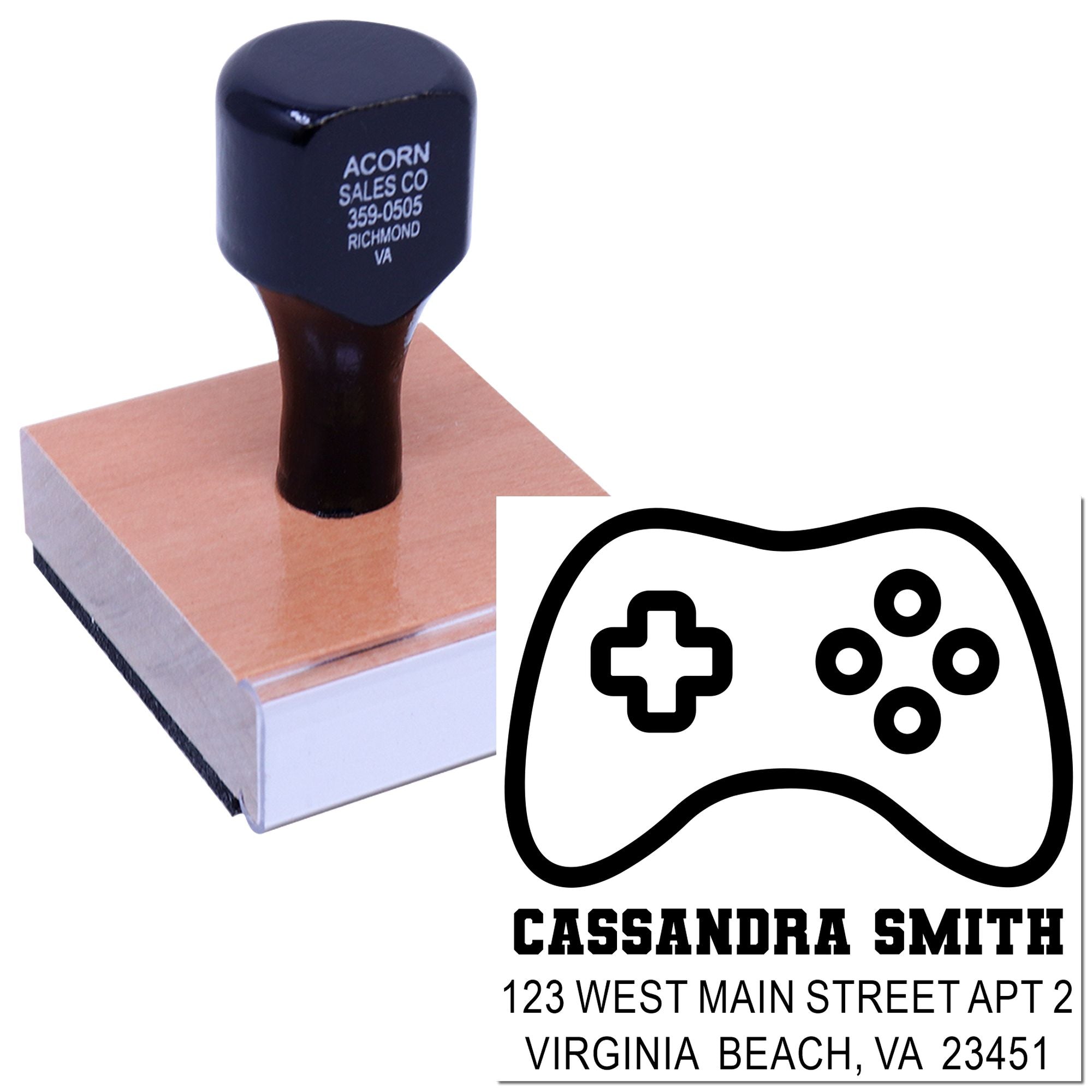 Custom self-inking rubber stamp with game controller design, name, and address for personalized gamer branding.