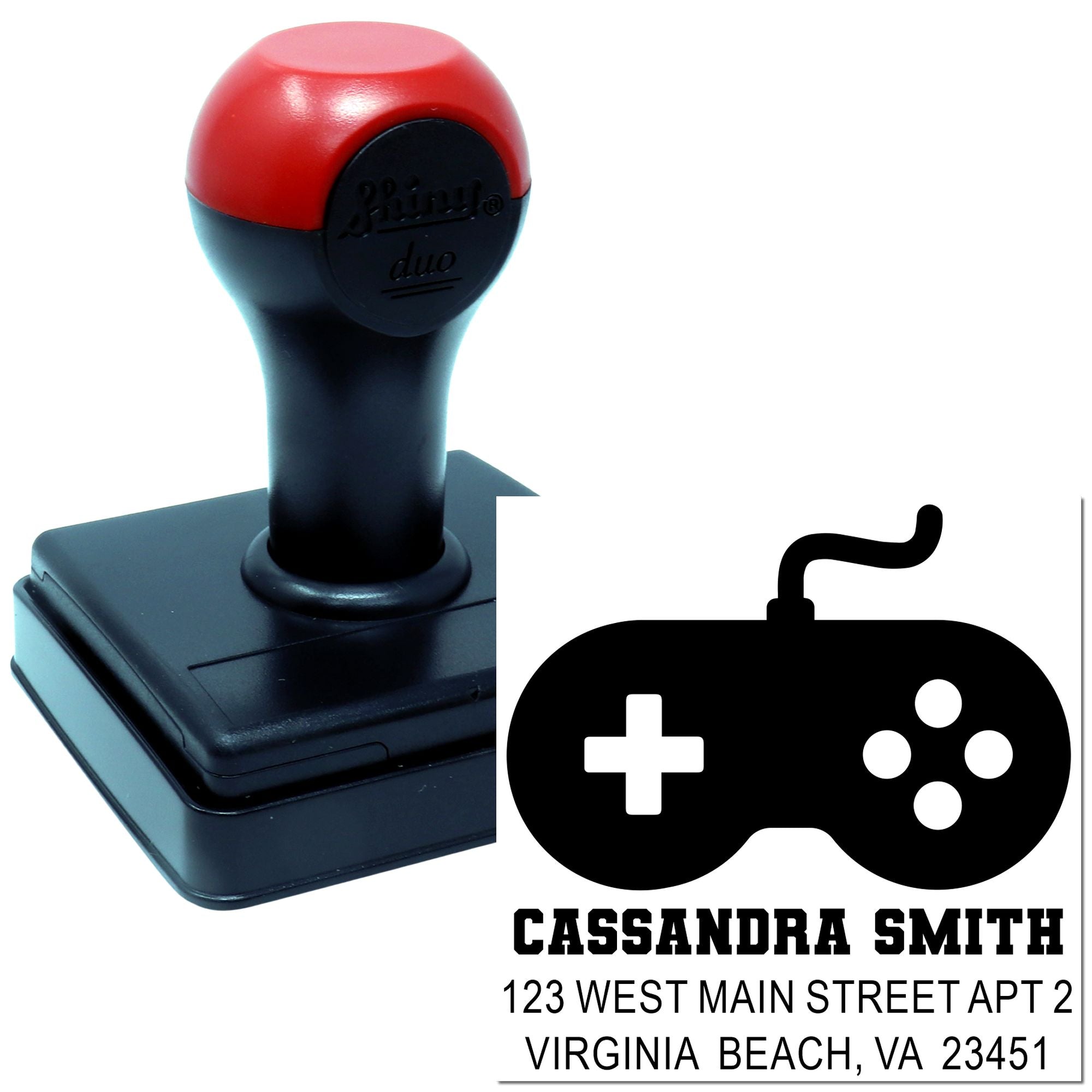 Custom self-inking rubber stamp with gamer controller design, name, and address for personalized return-address mailing.