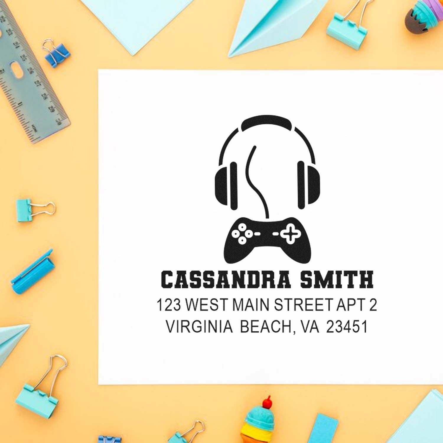 Custom gamer return address rubber stamp with headphones and controller design for Cassandra Smith in Virginia Beach.