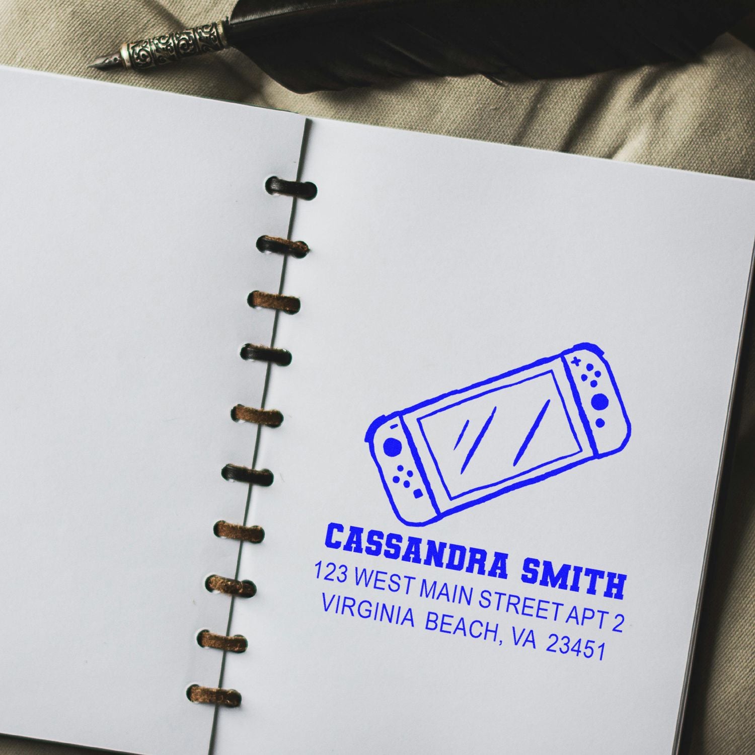 Personalized rubber stamp impression with Cassandra Smith return address on notebook page, Virginia Beach, VA.