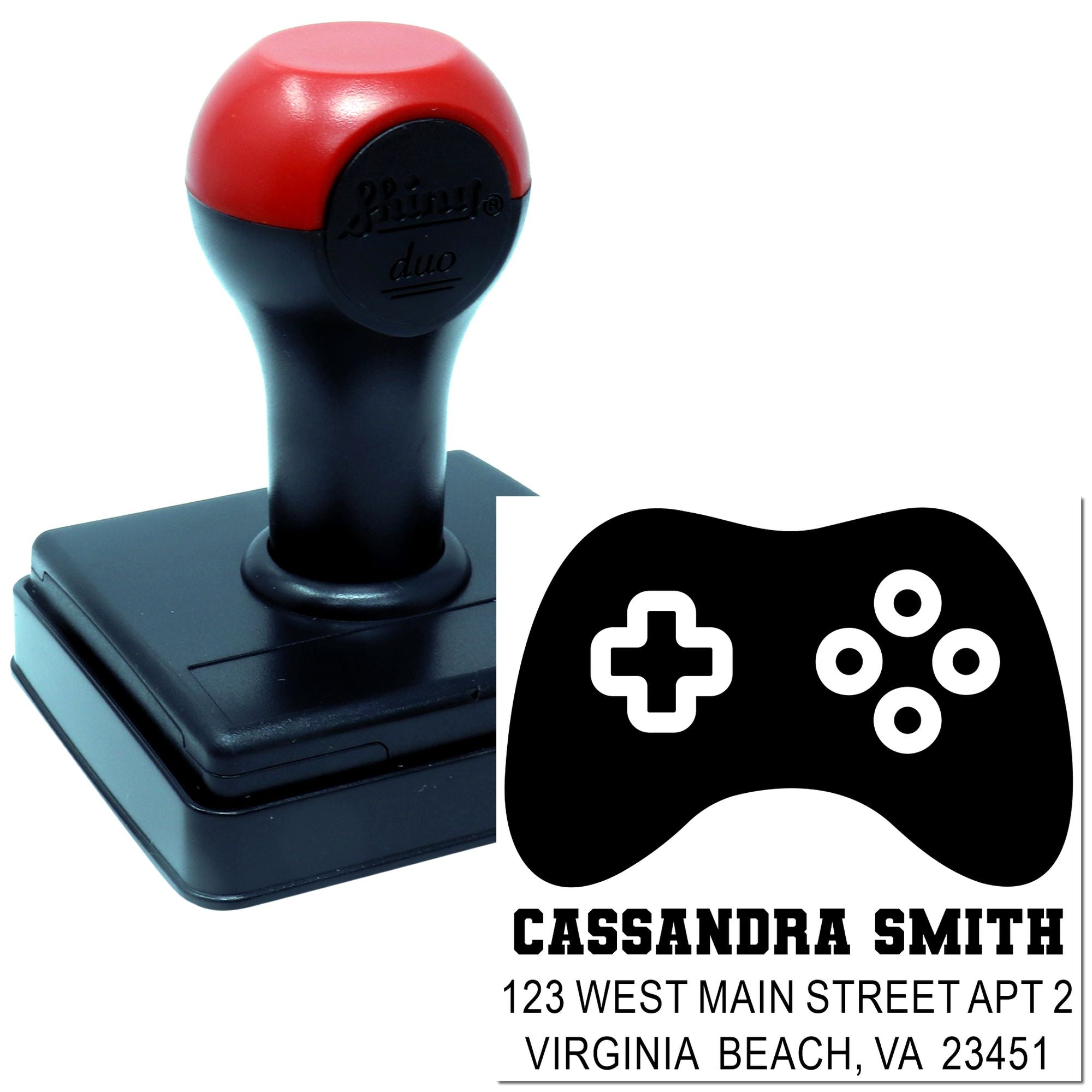 Personalized self-inking rubber stamp with video game controller design, name, and address for mailing labels.