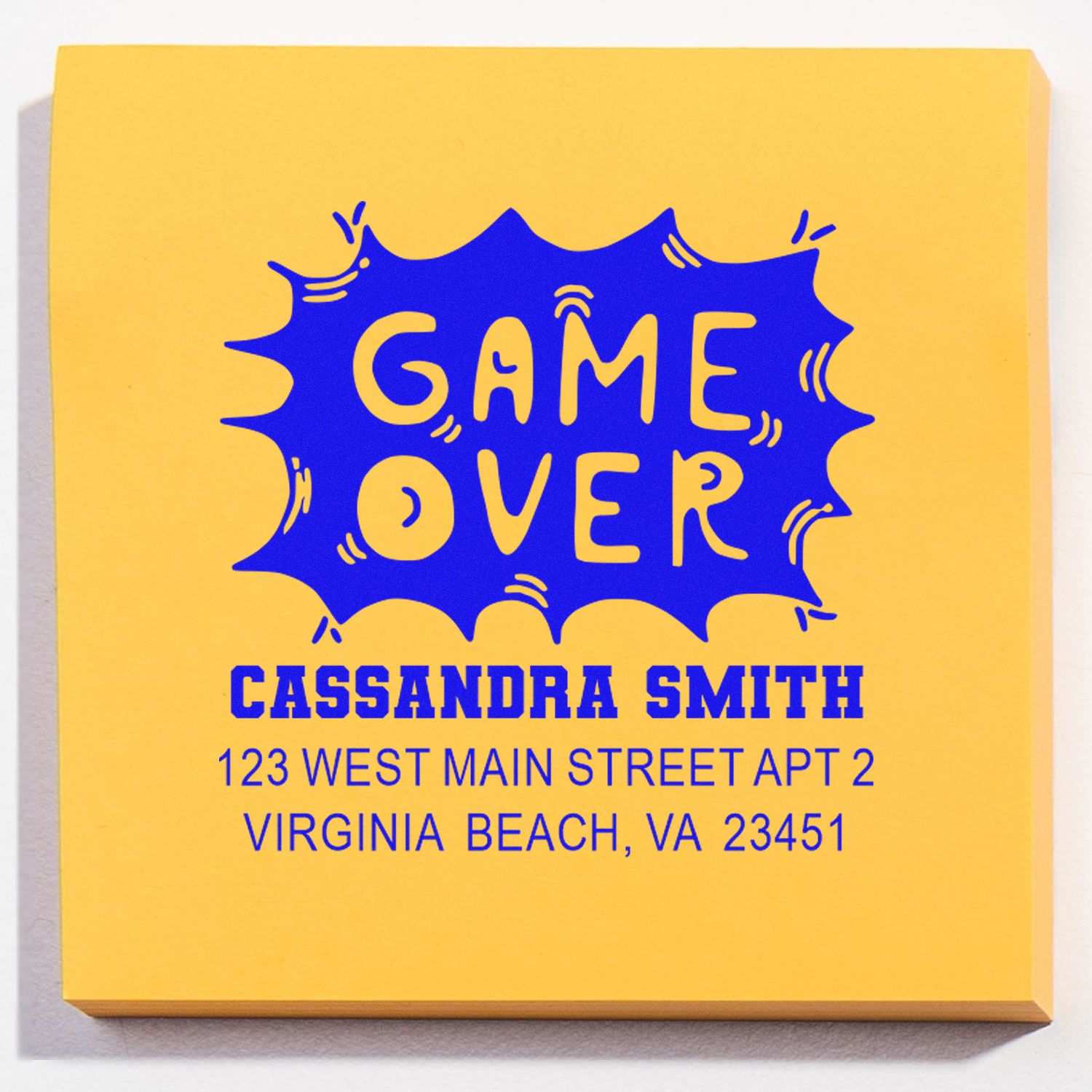 Custom rubber stamp with Game Over design and return address for Cassandra Smith, Virginia Beach, VA 23451.