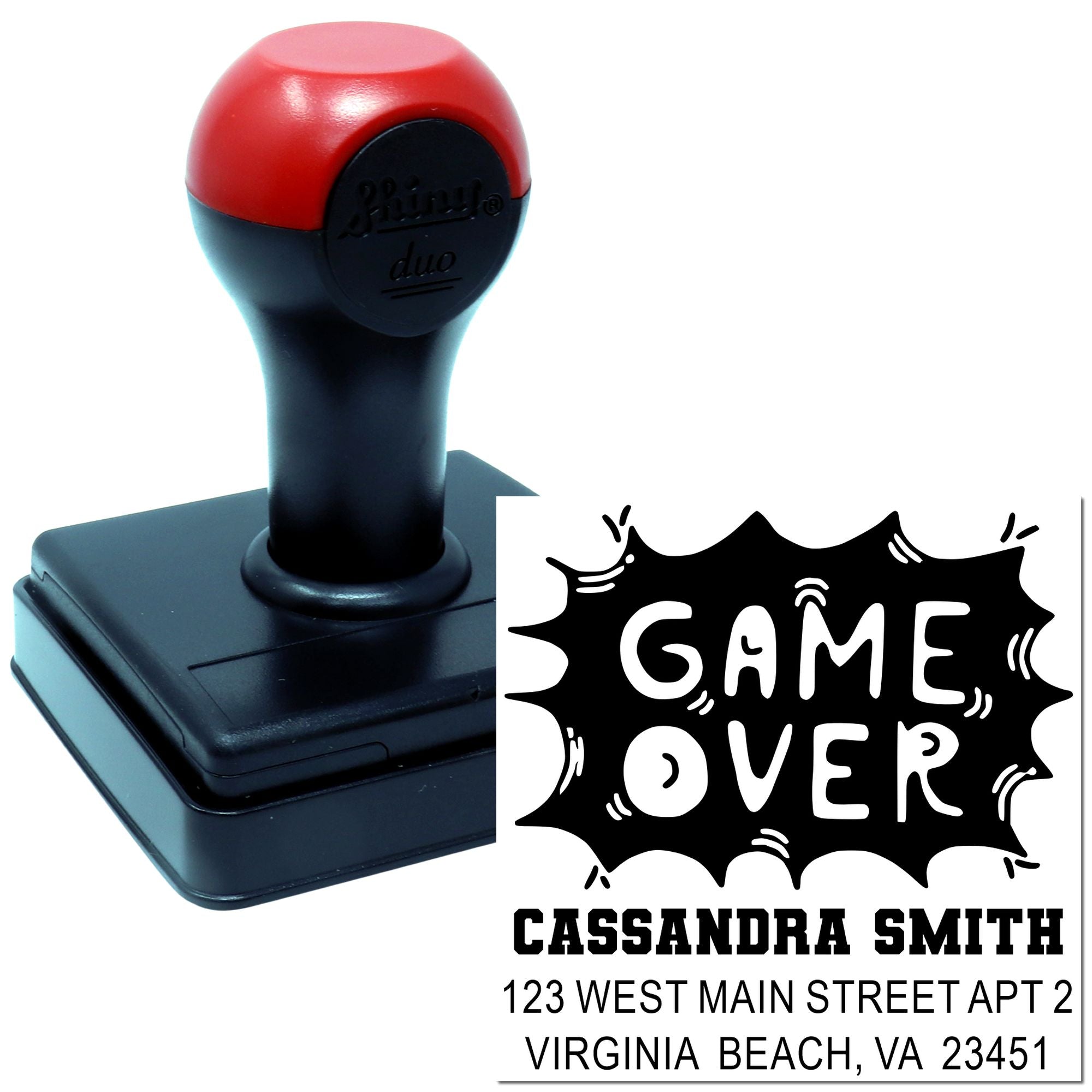Custom self-inking rubber stamp with Game Over design and personalized name and address for return address stamping.