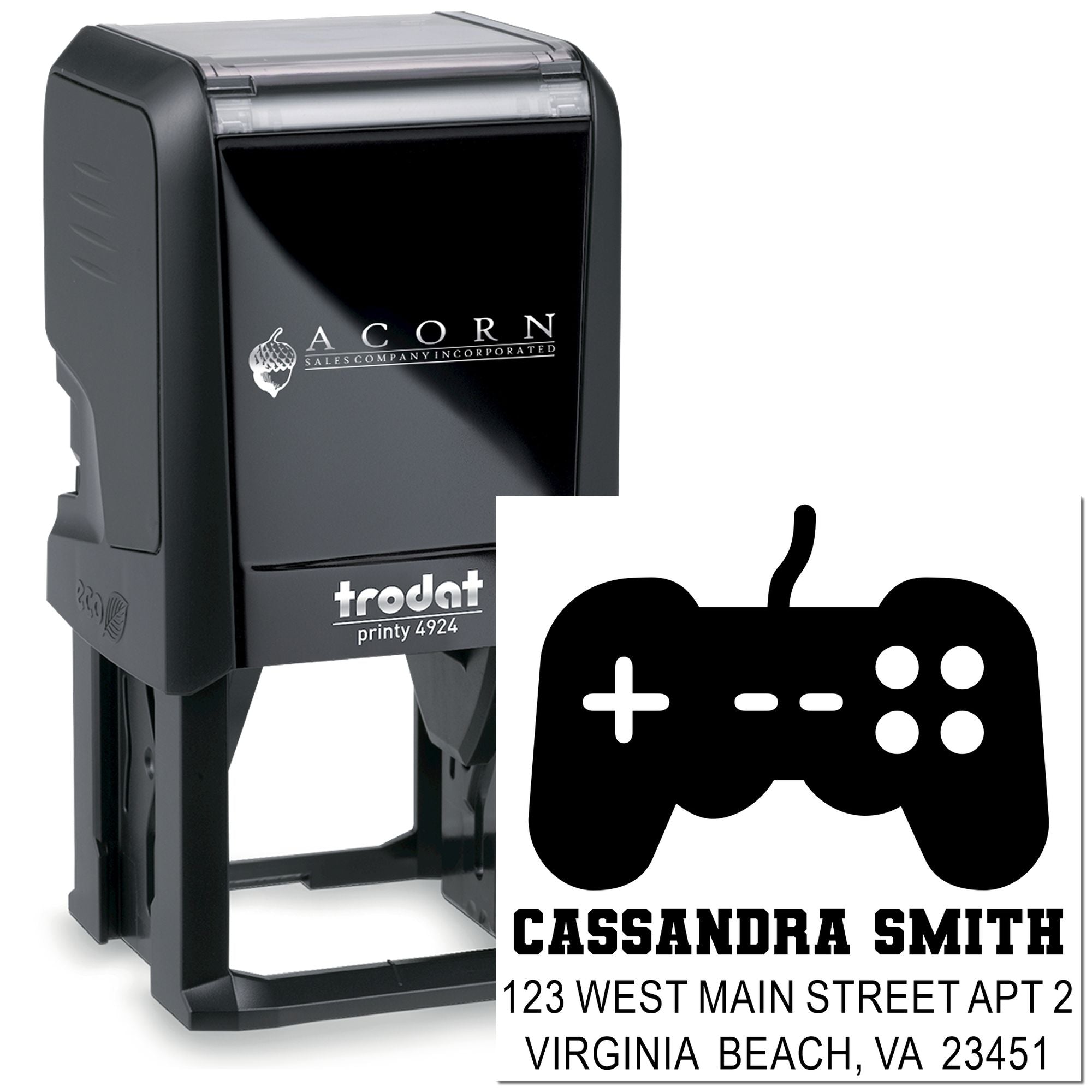 Custom self-inking rubber stamp with gamer controller logo and return address for Cassandra Smith in Virginia Beach.